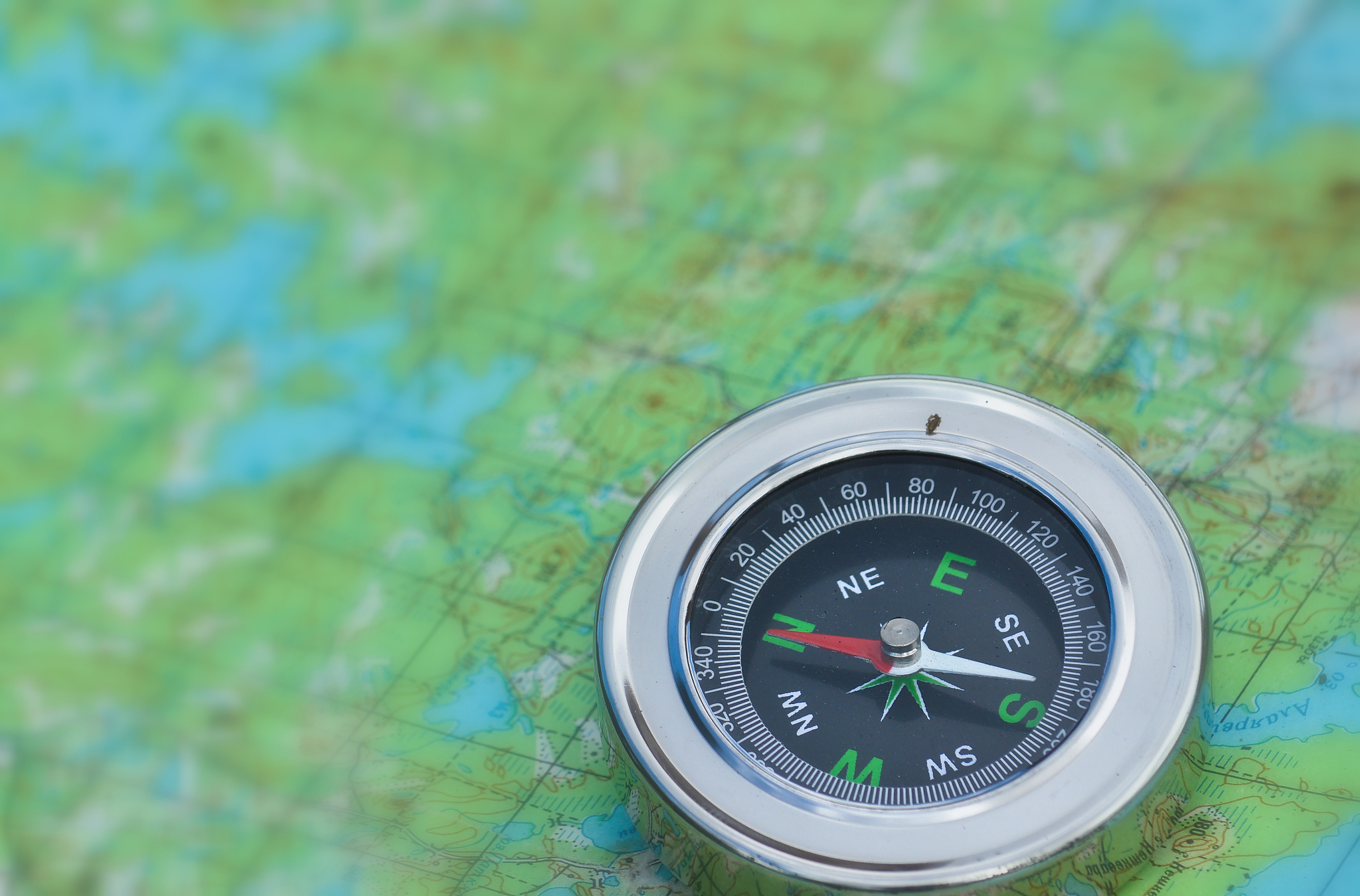 map with a compass.
