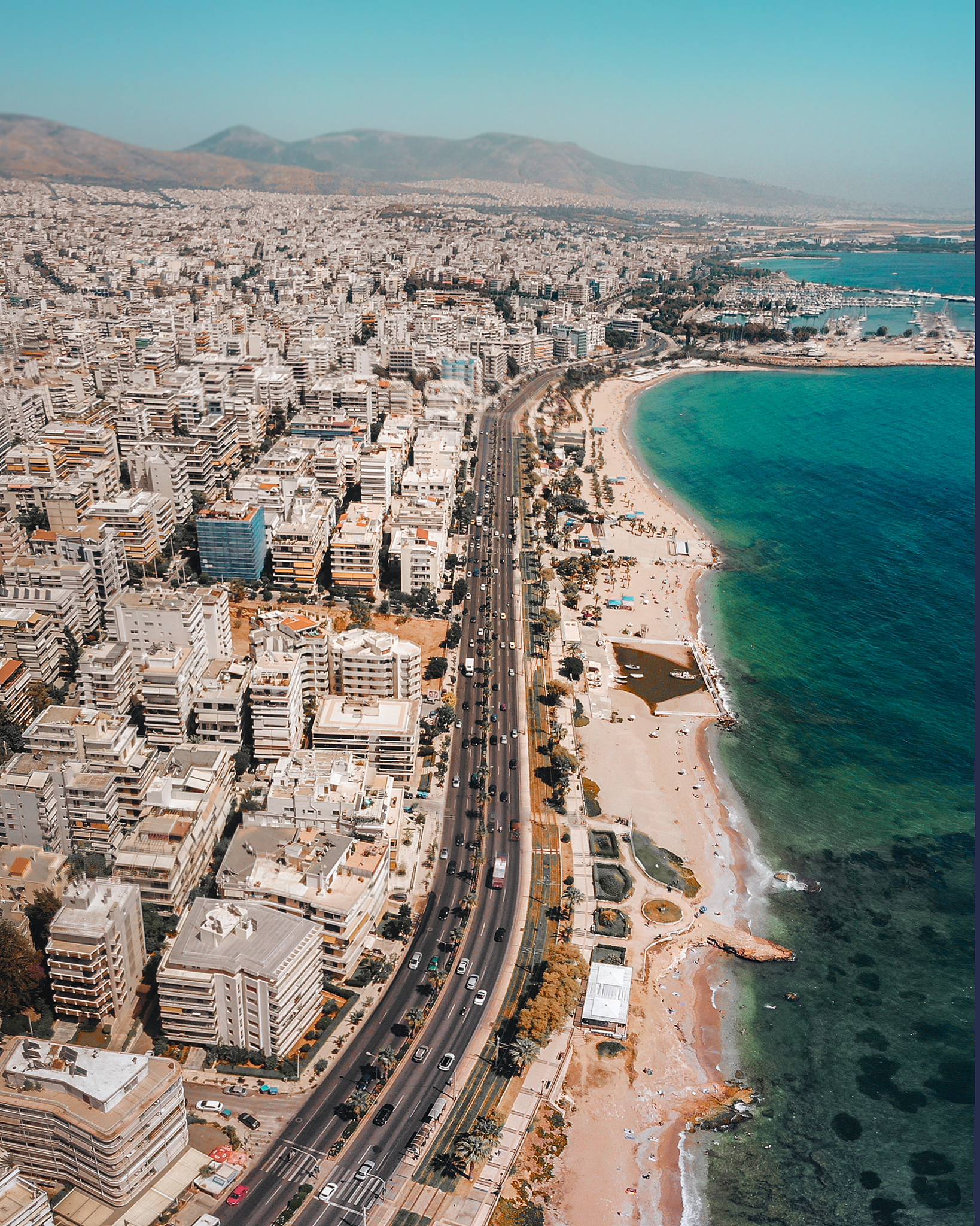 high angle view of buildings by sea