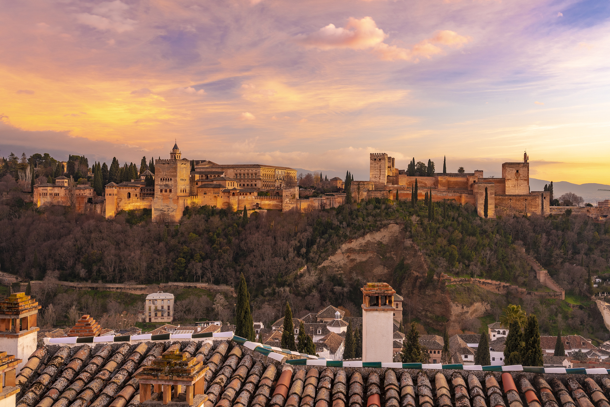 view of the alhambra, unesco world heritage site, with the sierr