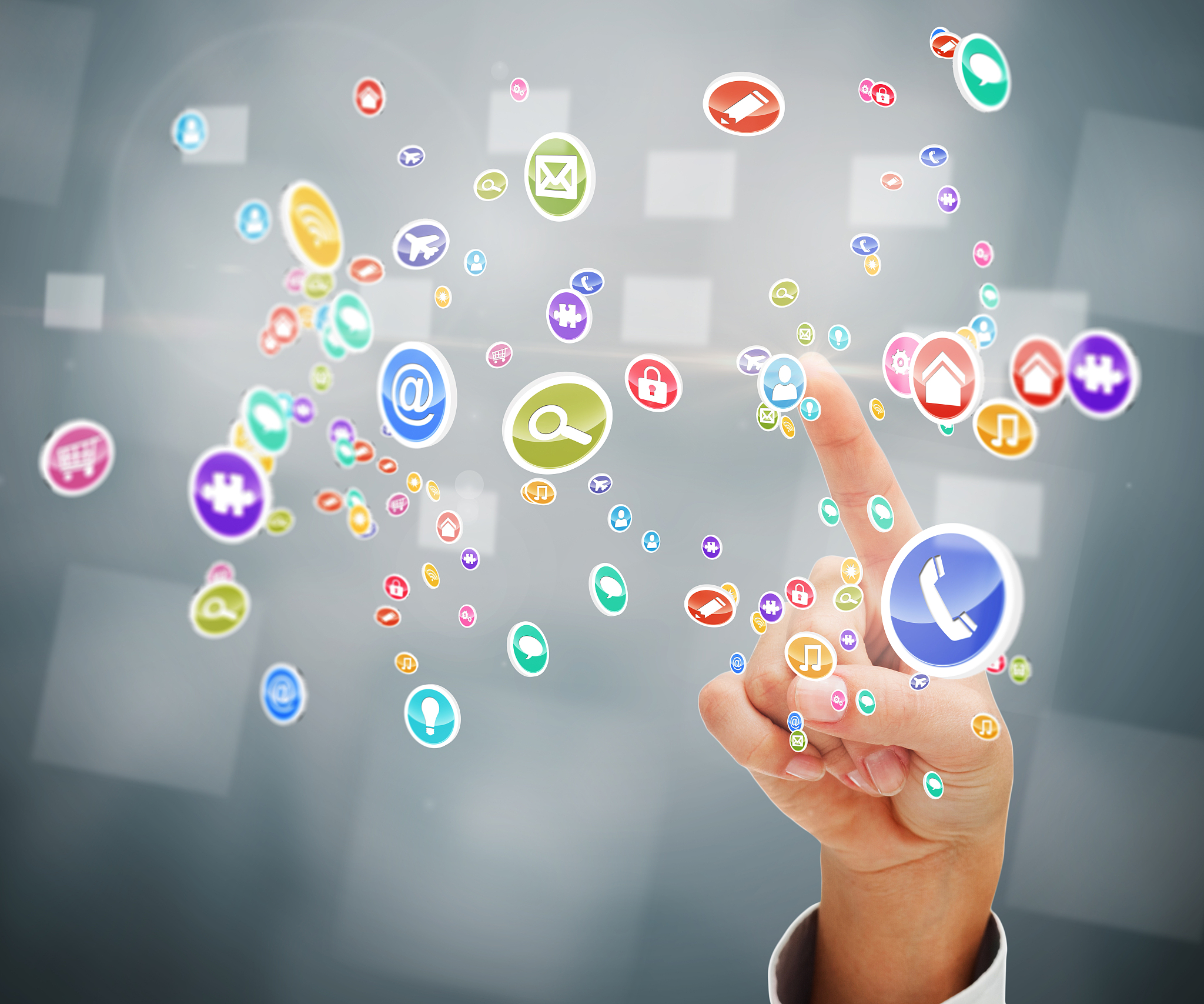 hand pointing to colourful computer applications