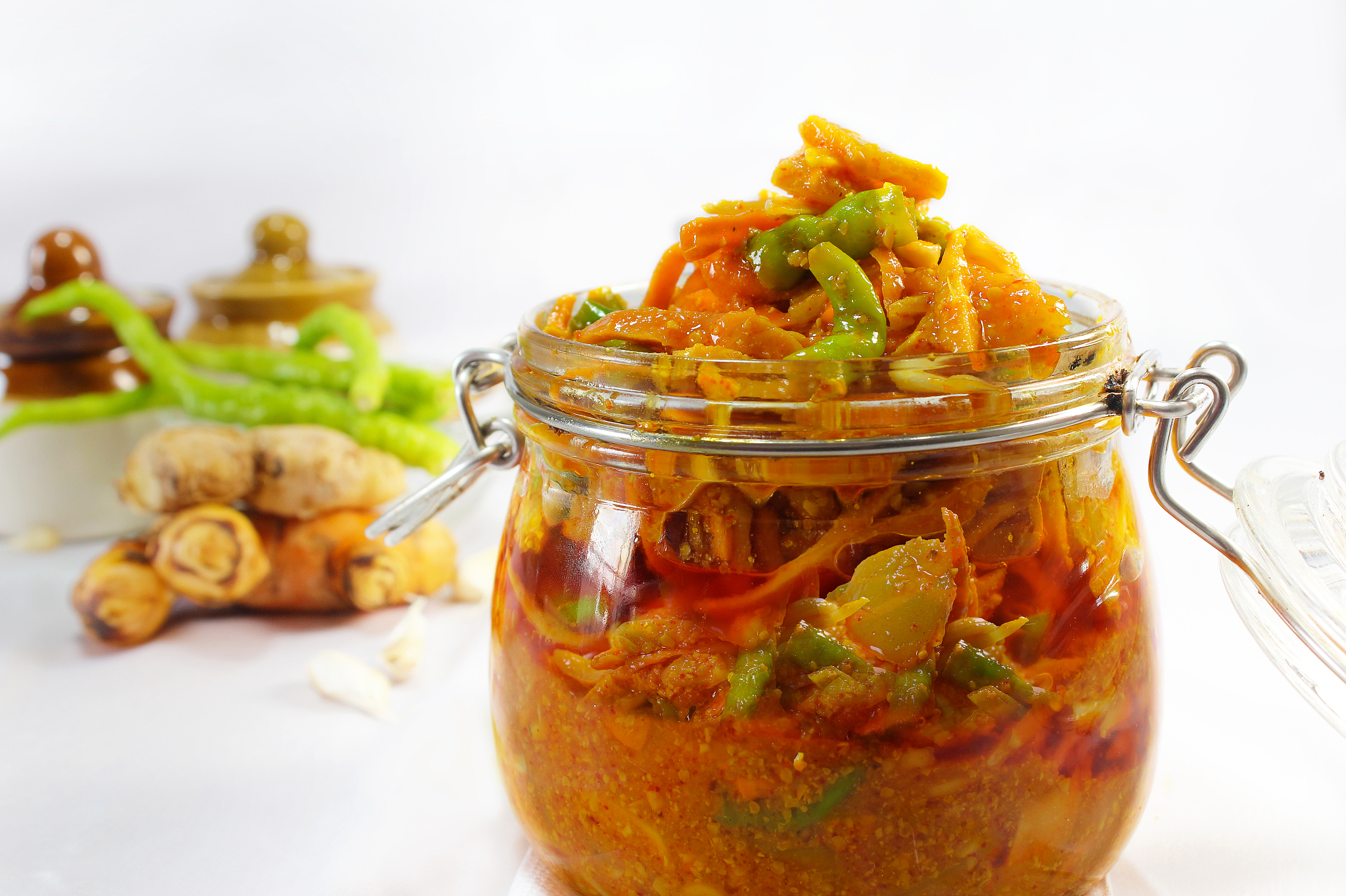 indian spicy mixed pickle prepared at home and served in glass j