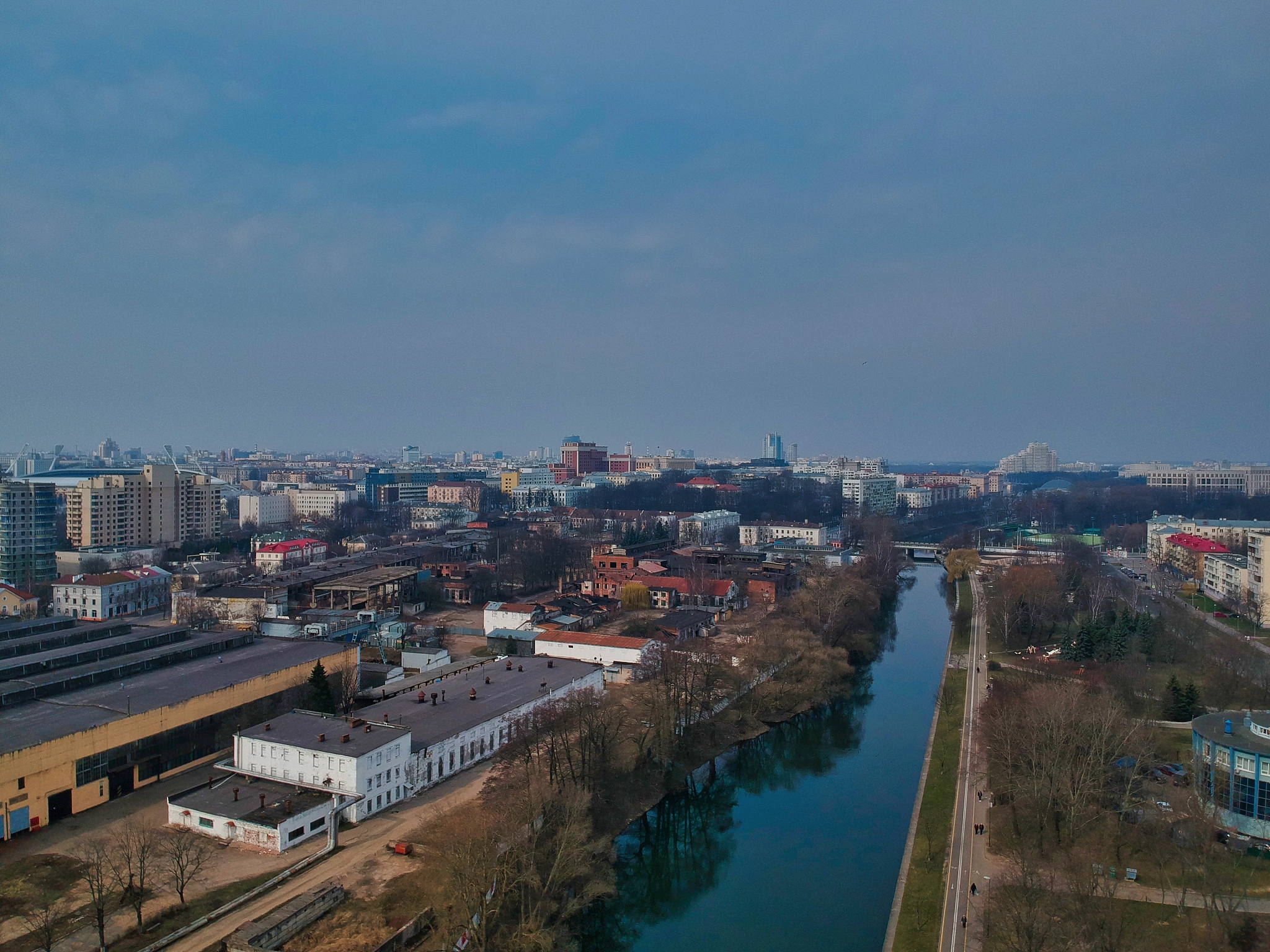 high angle view of river amidst buildings in city