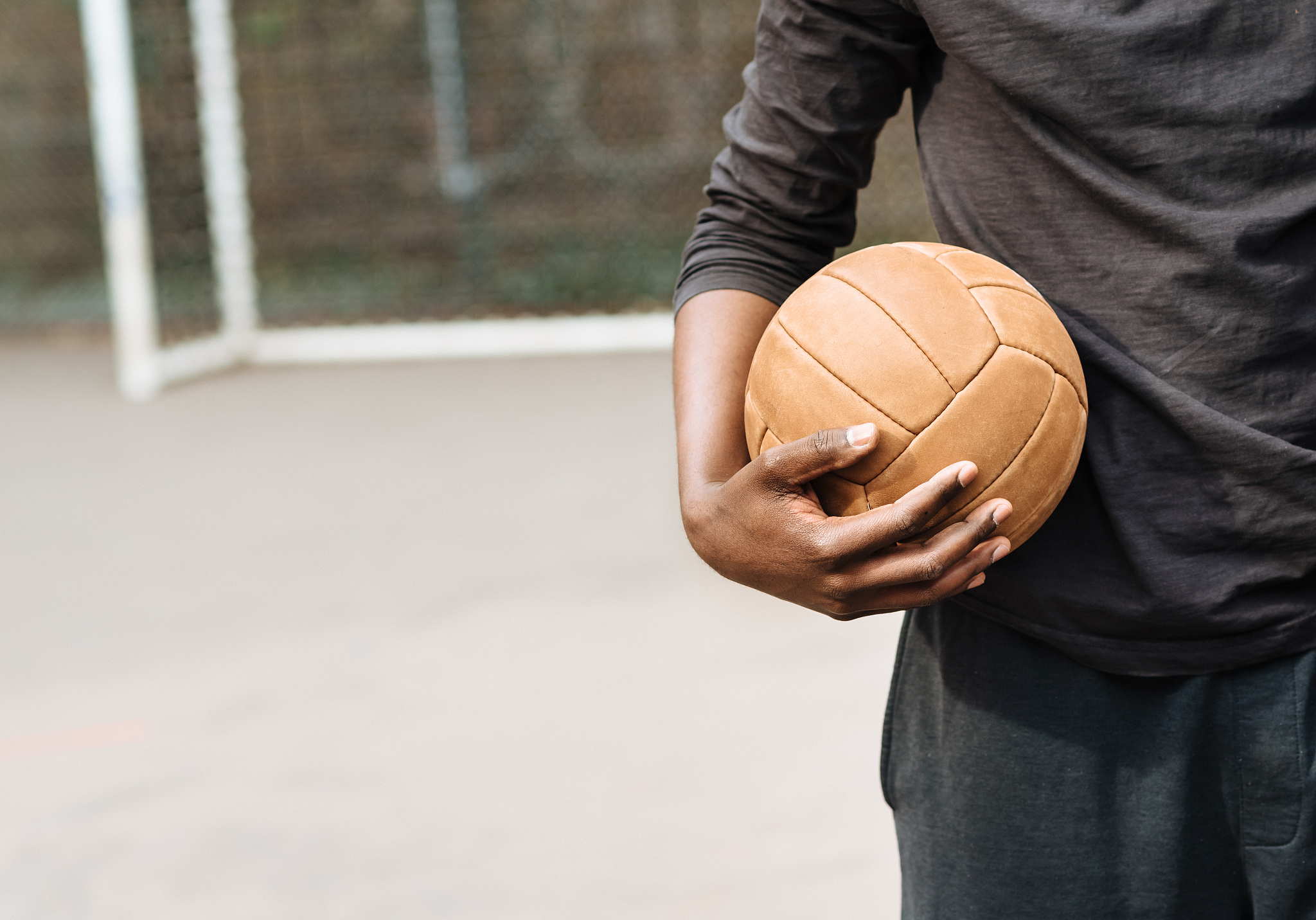 man holding soccer ball