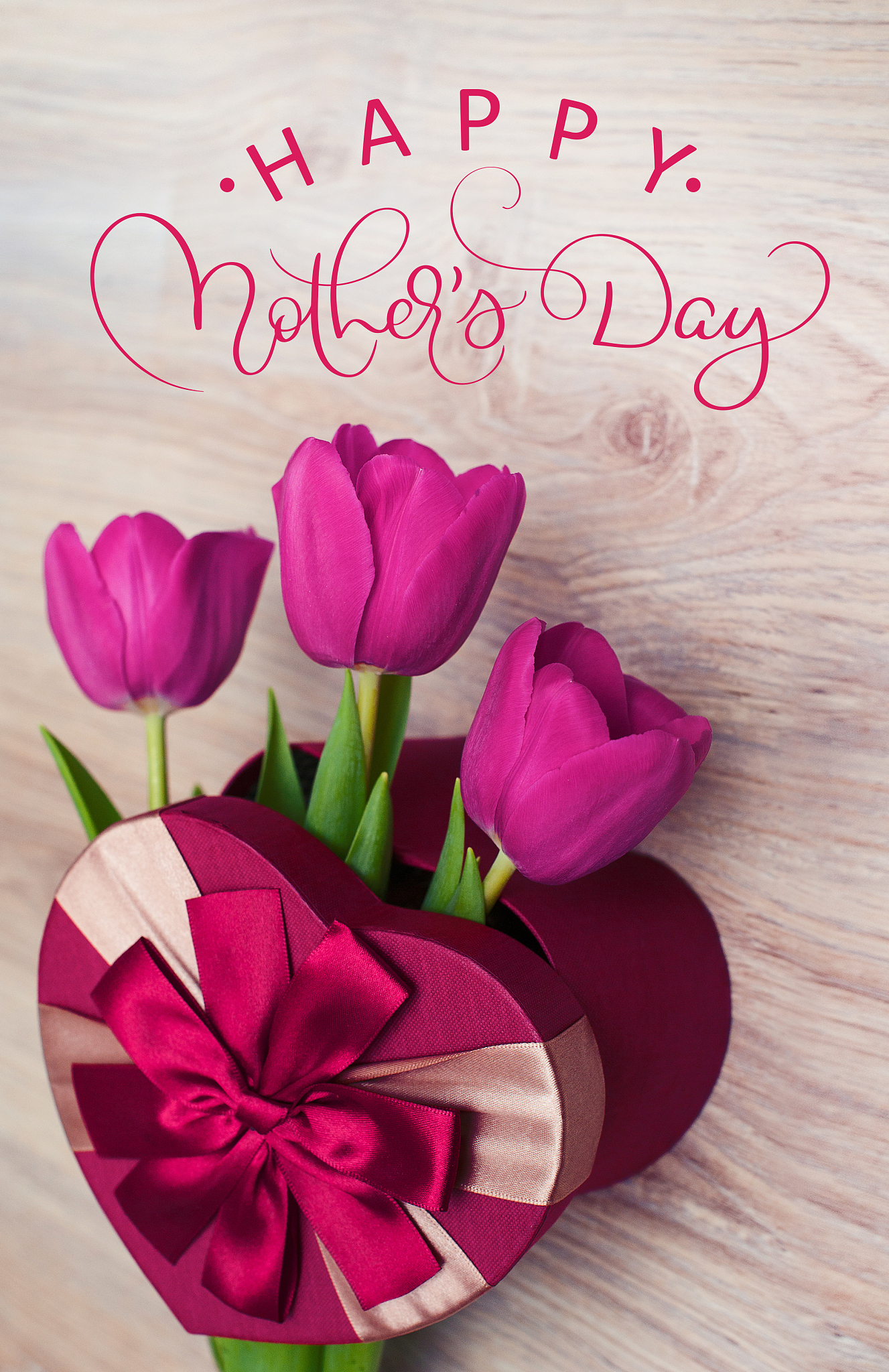 three tulip in red gift box in form of heart and text happy moth