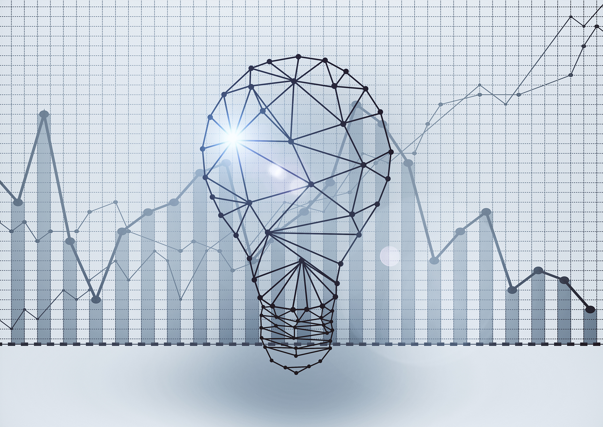 polygonal lightbulb with business charts