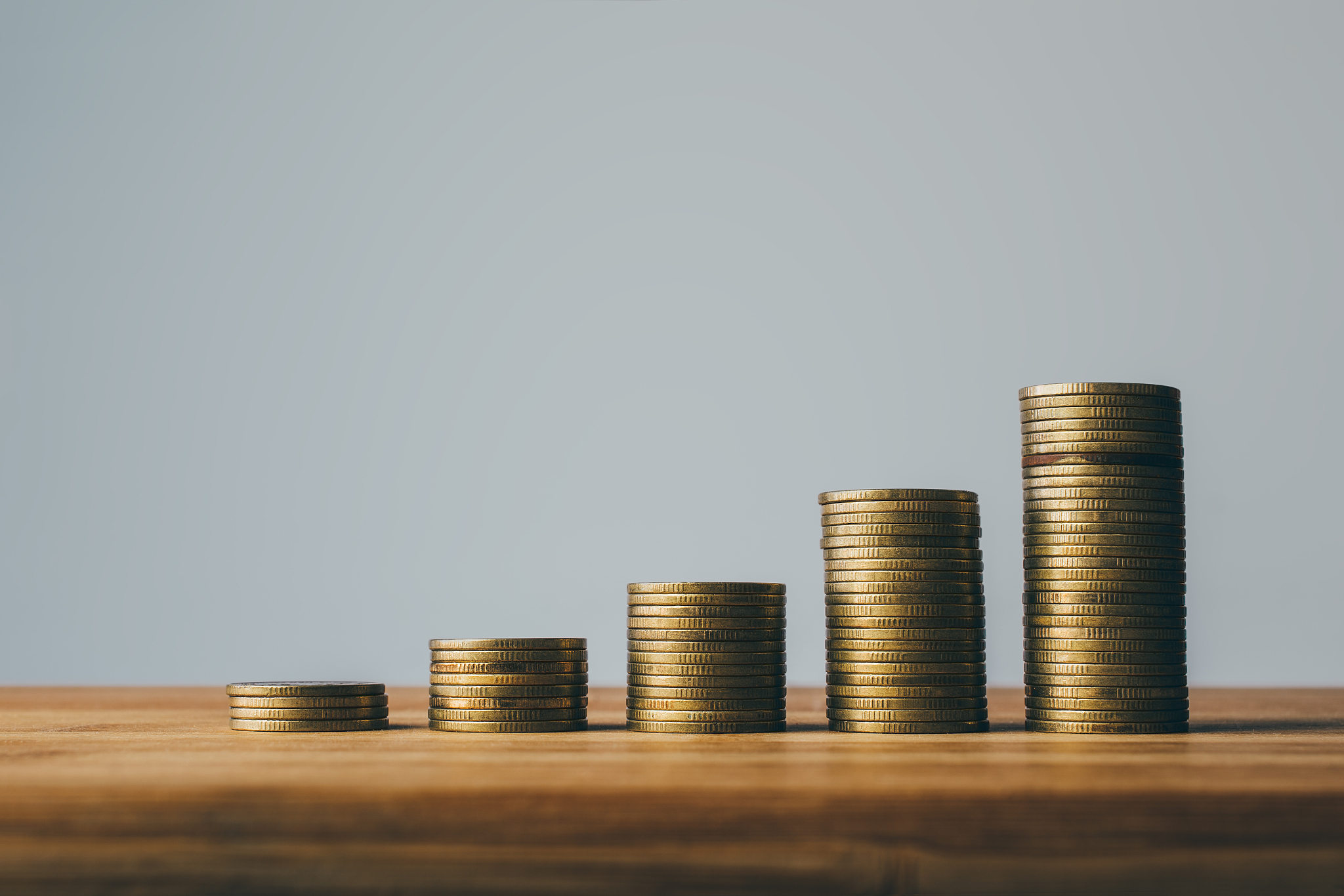 rows of coins finance and banking background design concept.