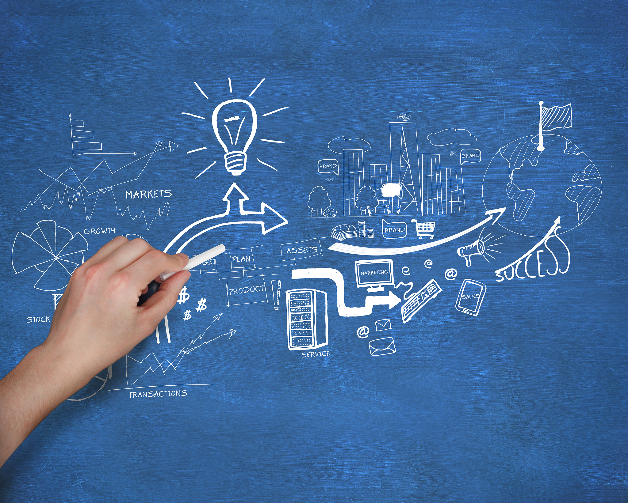 composite image of hand writing brainstorm with chalk