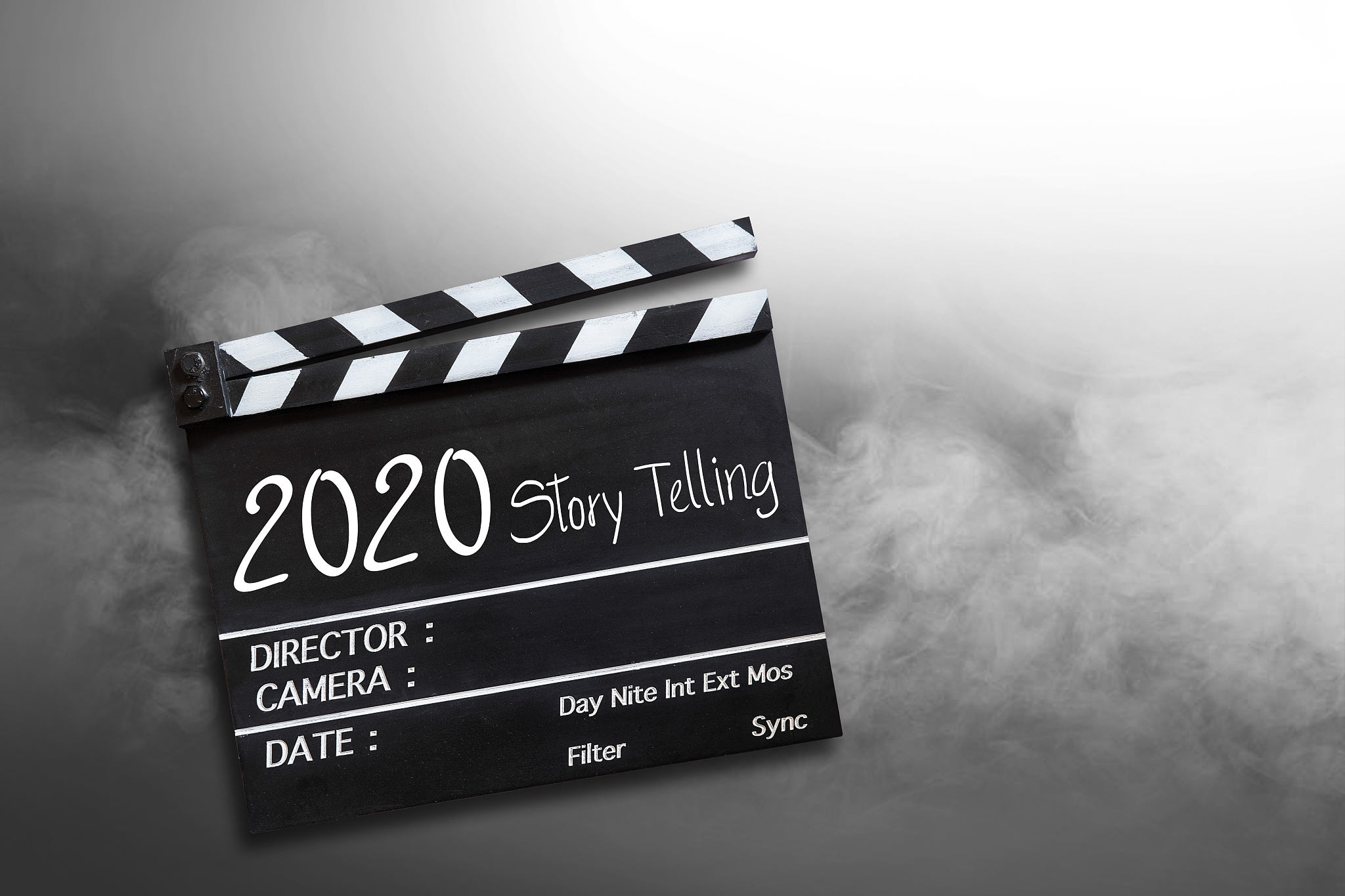 years 2020 story telling.world title on film slate