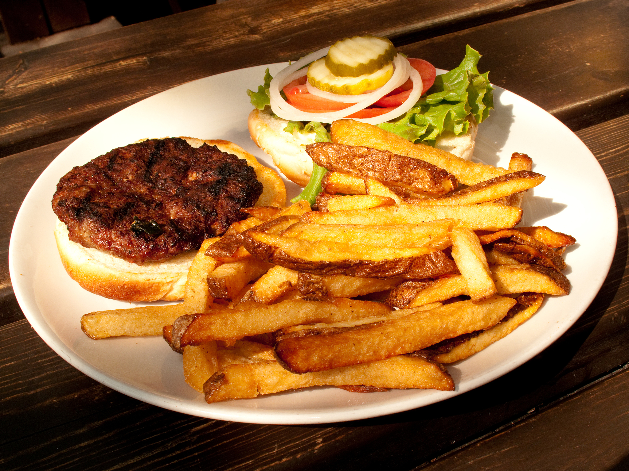 burger and fries on plate