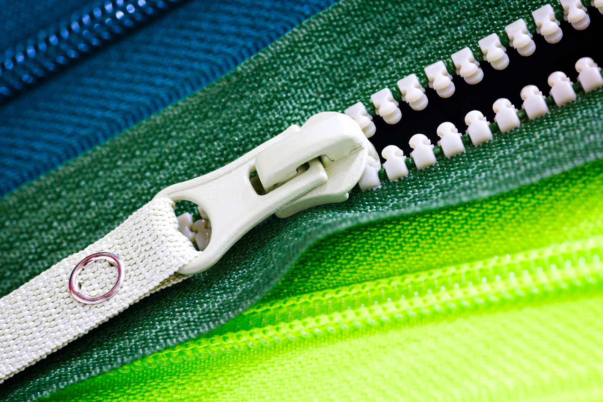 zip background texture of zippers sliders. a lot of zippers in d