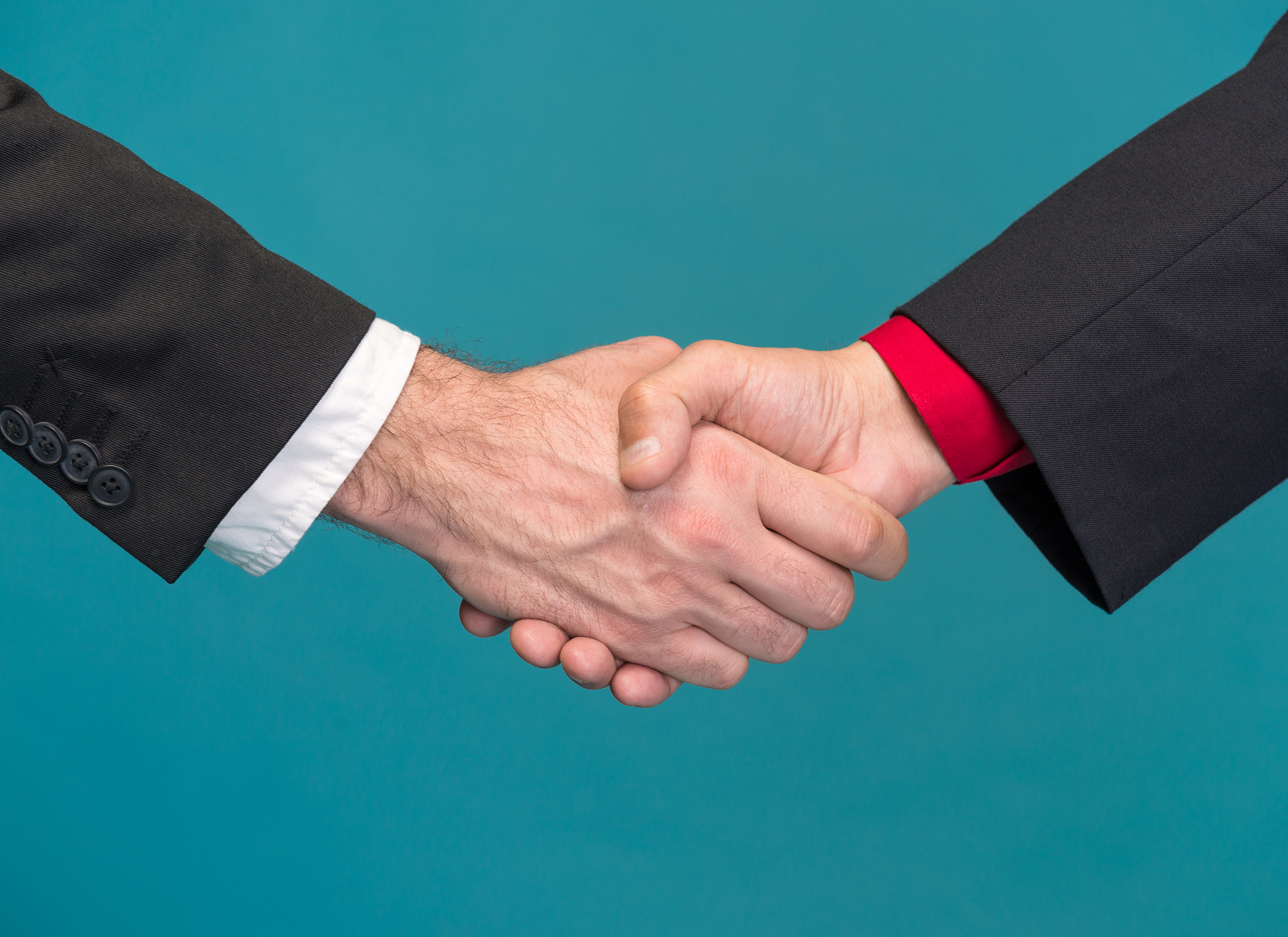 two businessmen shaking hands