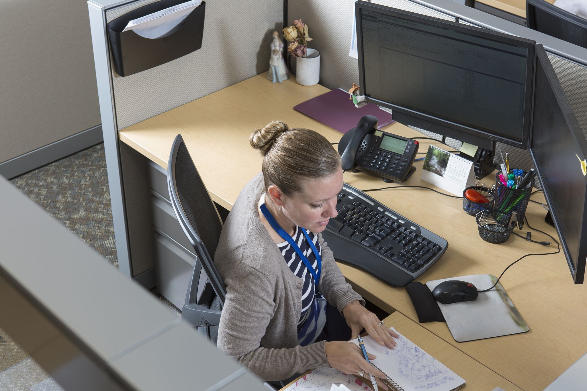 female executive working in customer service center of electric 