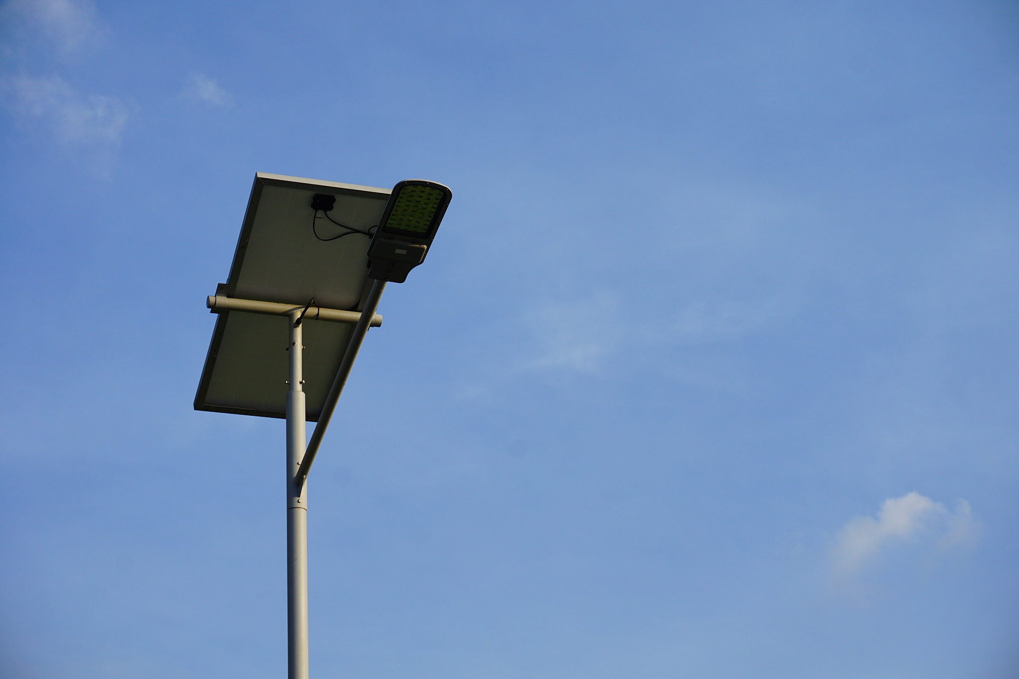 led street light with solar cell and blue sky background