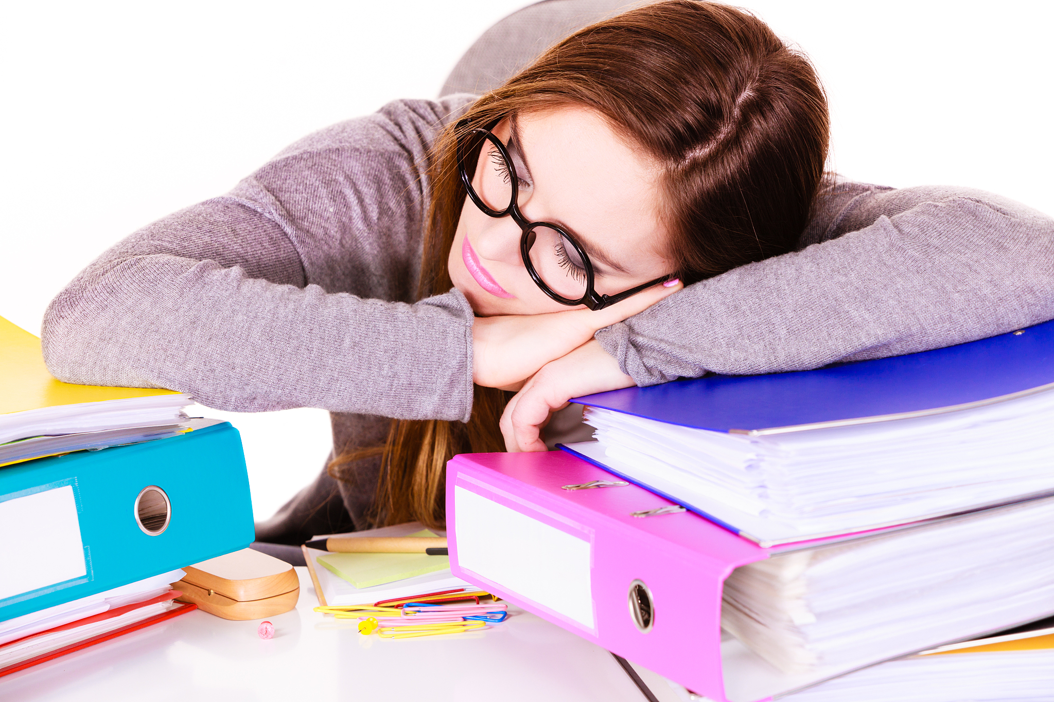 woman tired with stack of folders documents