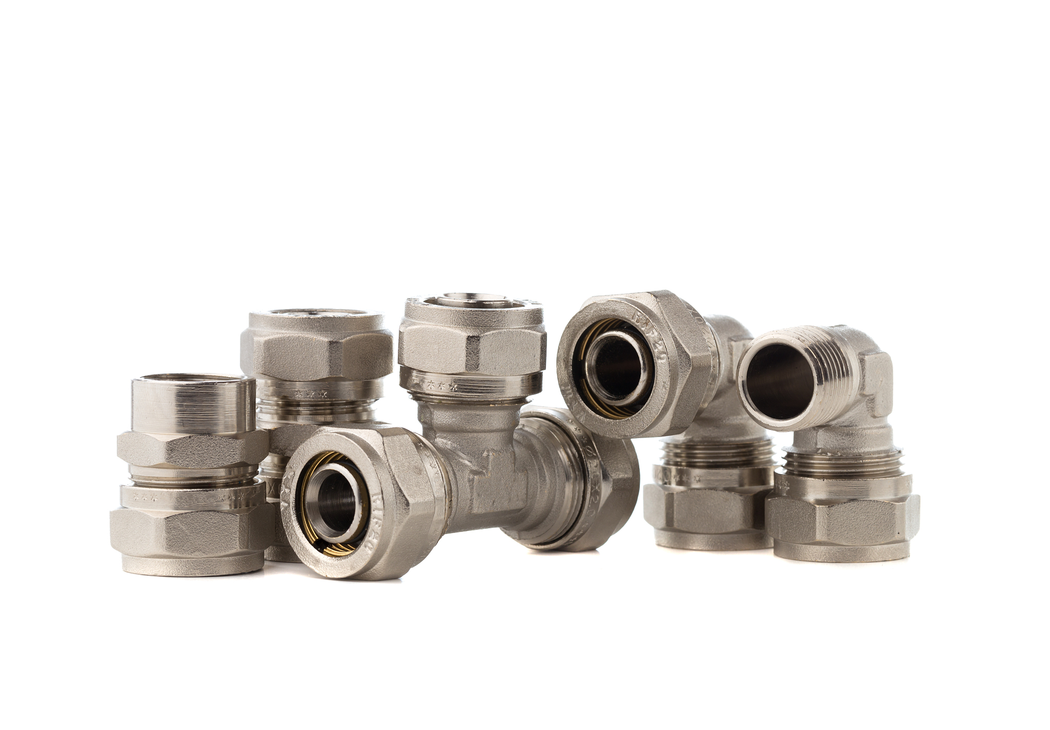 fittings for water on a white background. brass fittings close-u