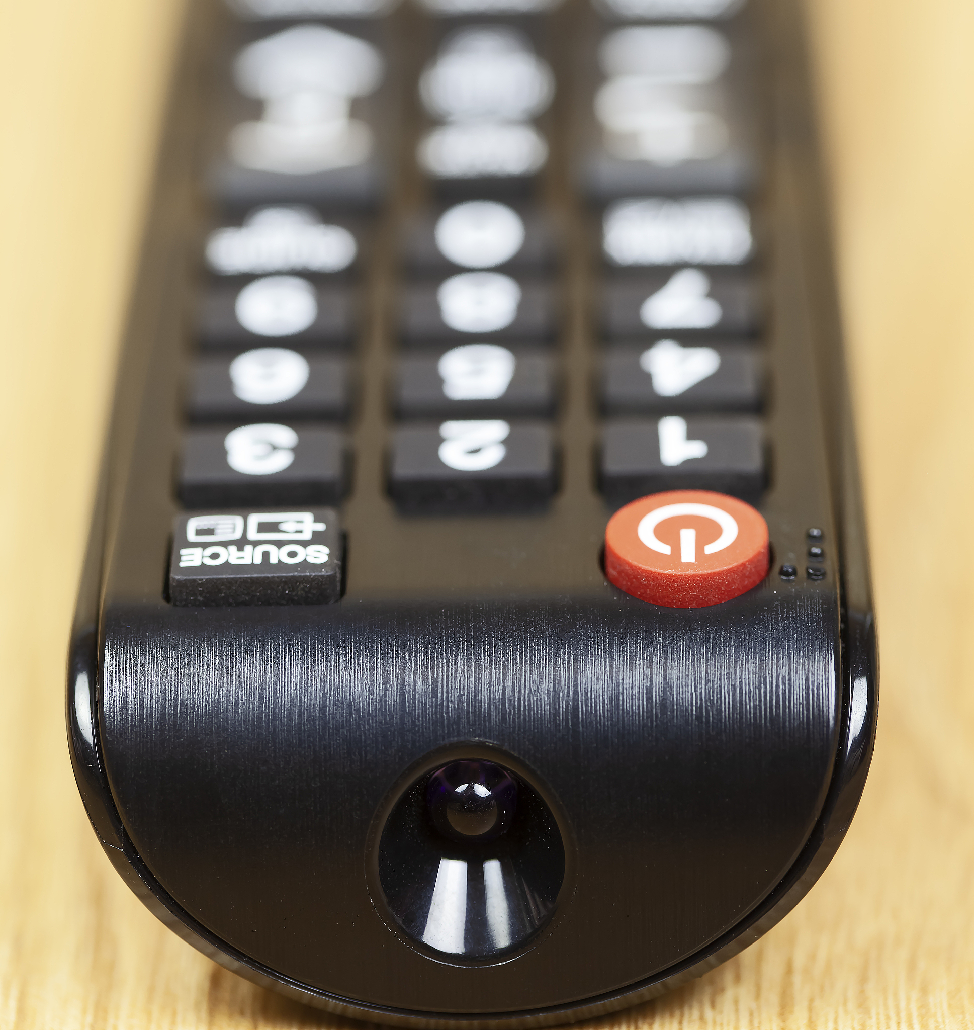 close-up of remote control on table at home