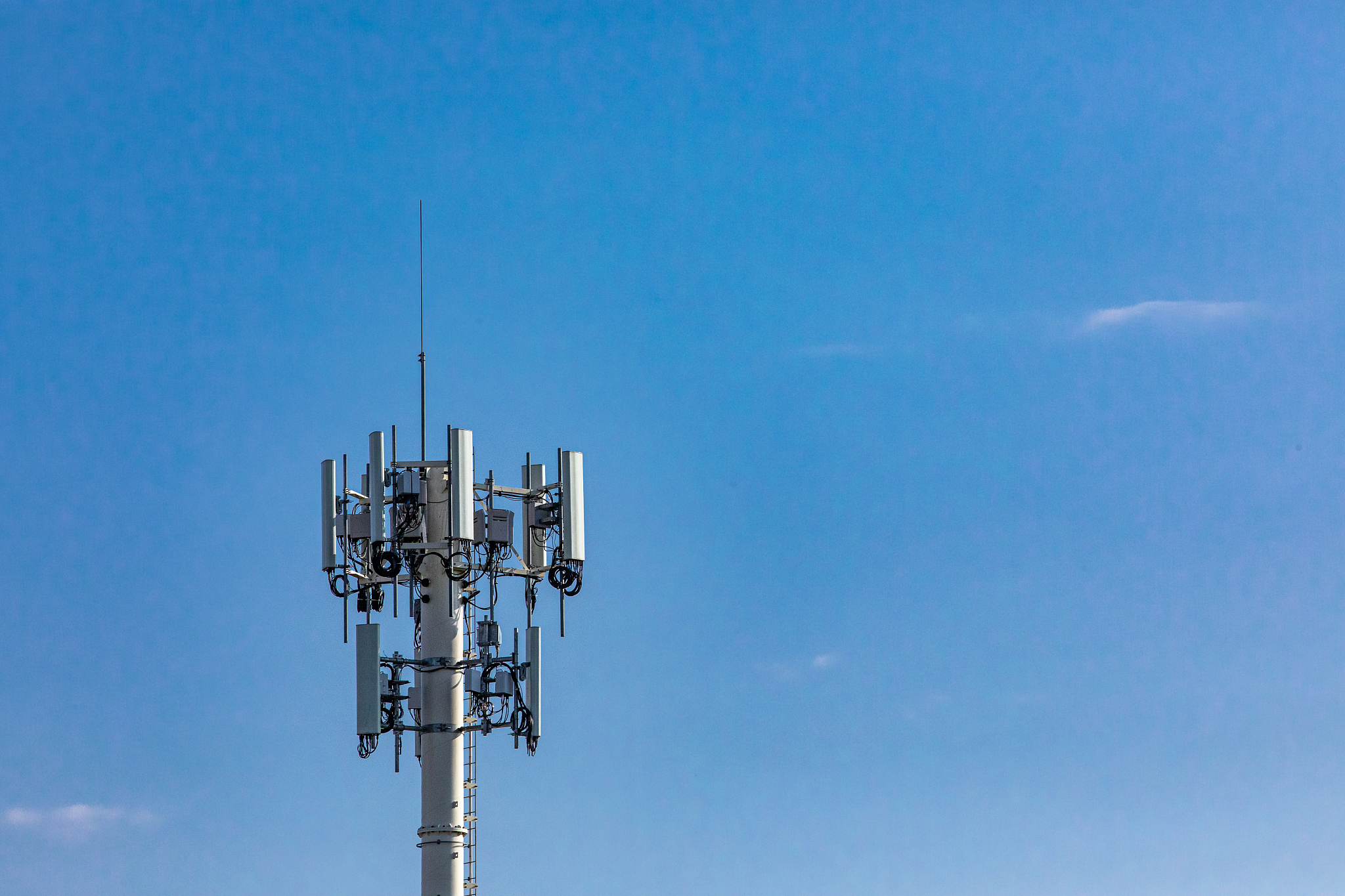 cellular base station against blue sky.