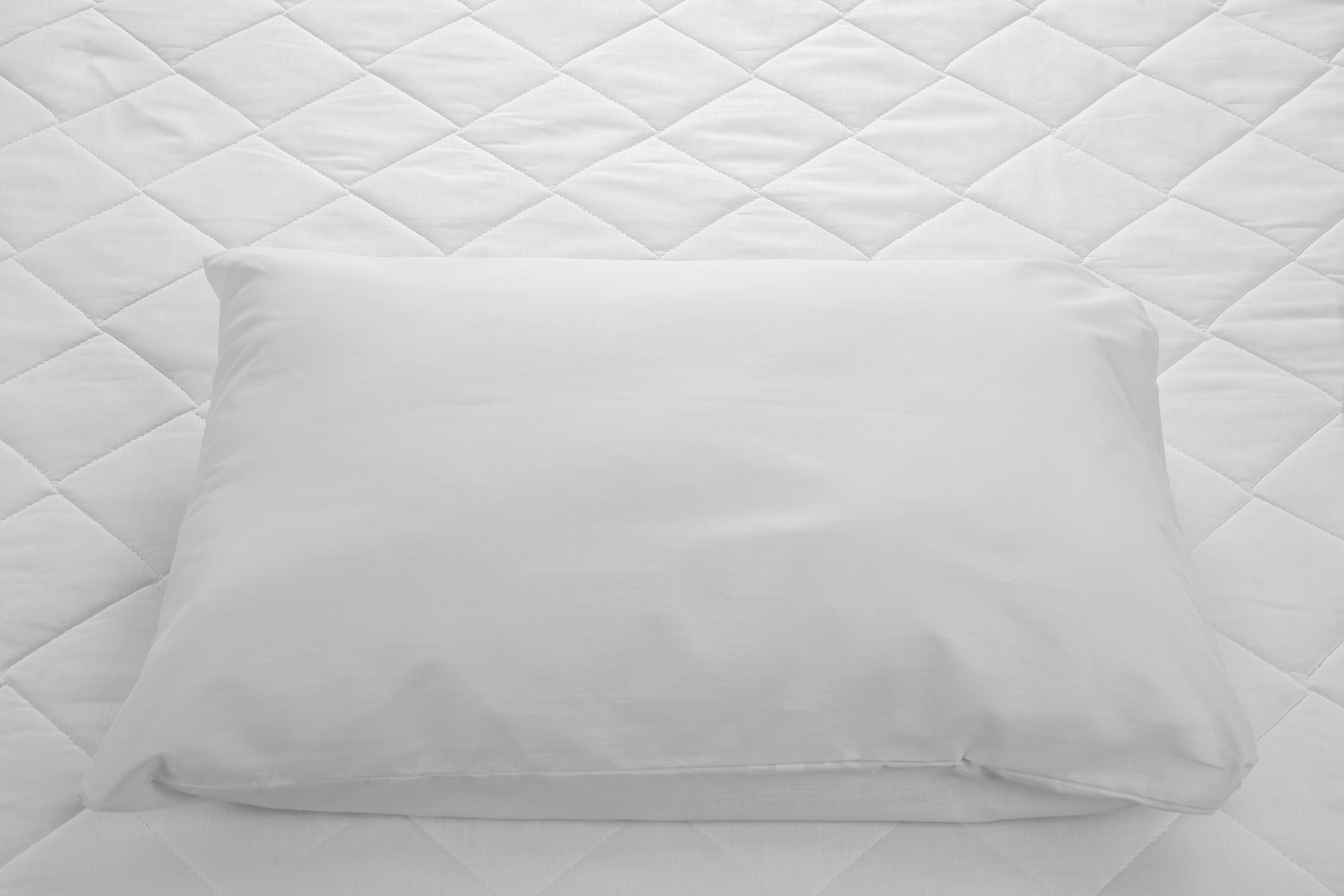 white bed.