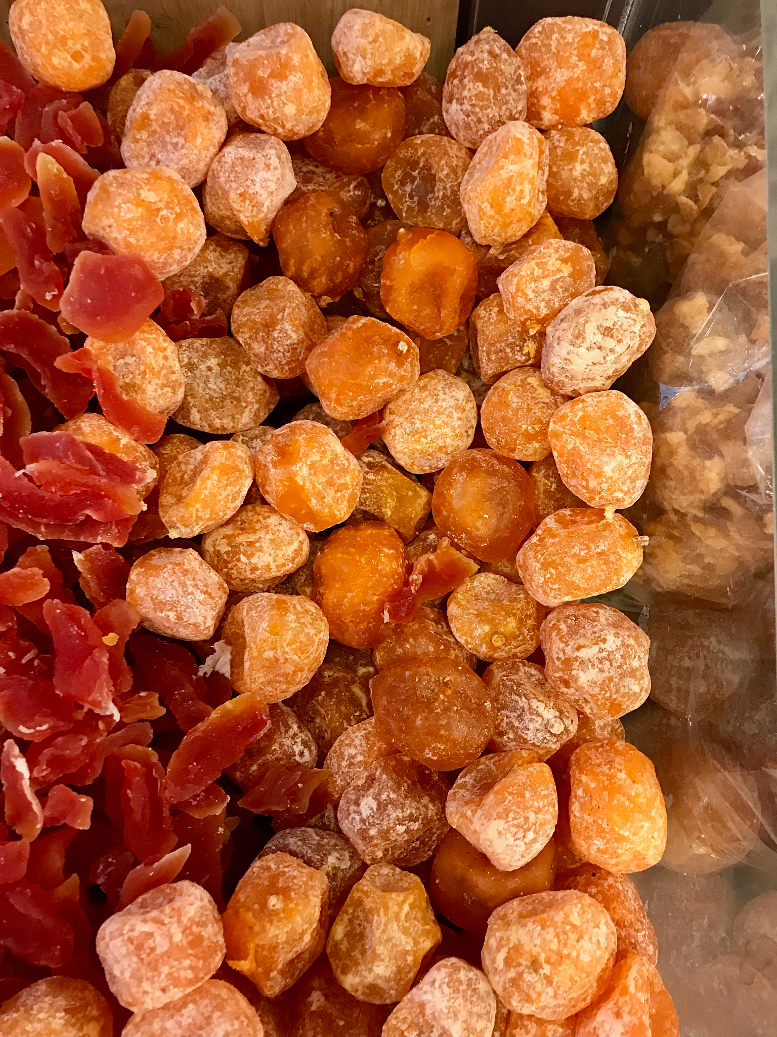 dried papaya and kumquat / cumquat orange for sale at market baz
