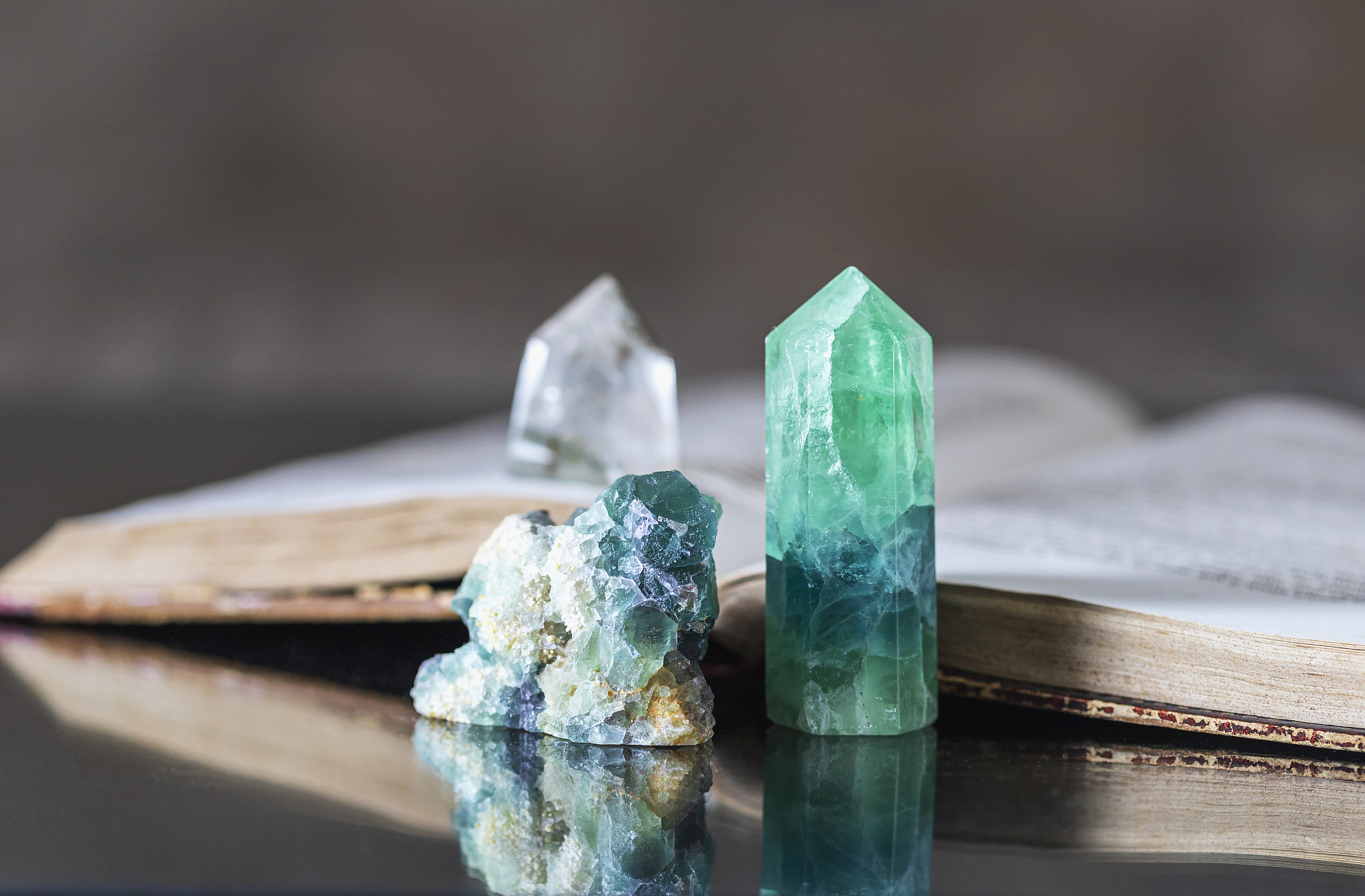 old book and mineral stones crystals. crystal ritual, healing cr