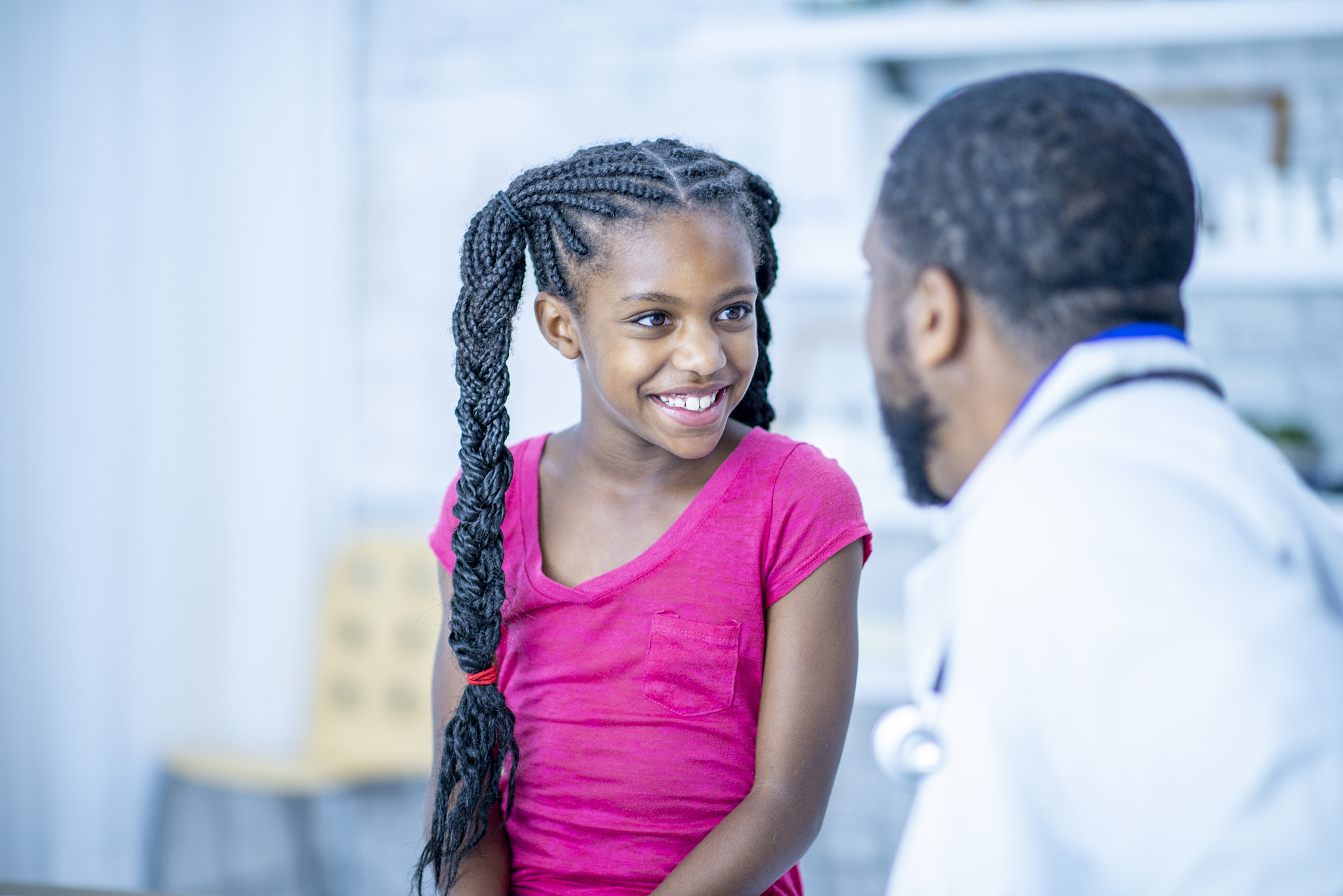 cute girl smiling during her medical check up
