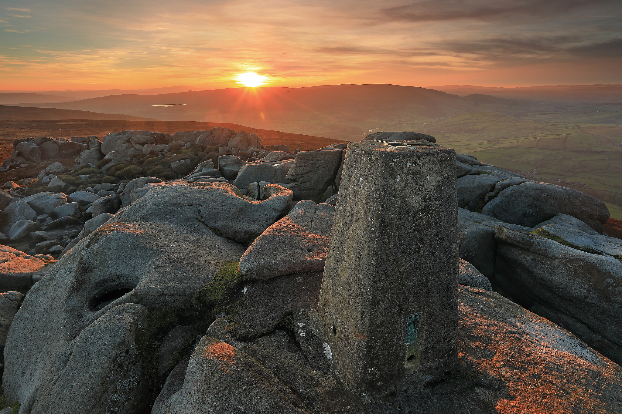 sunset from the summit of simon's seat, yorkshire dales