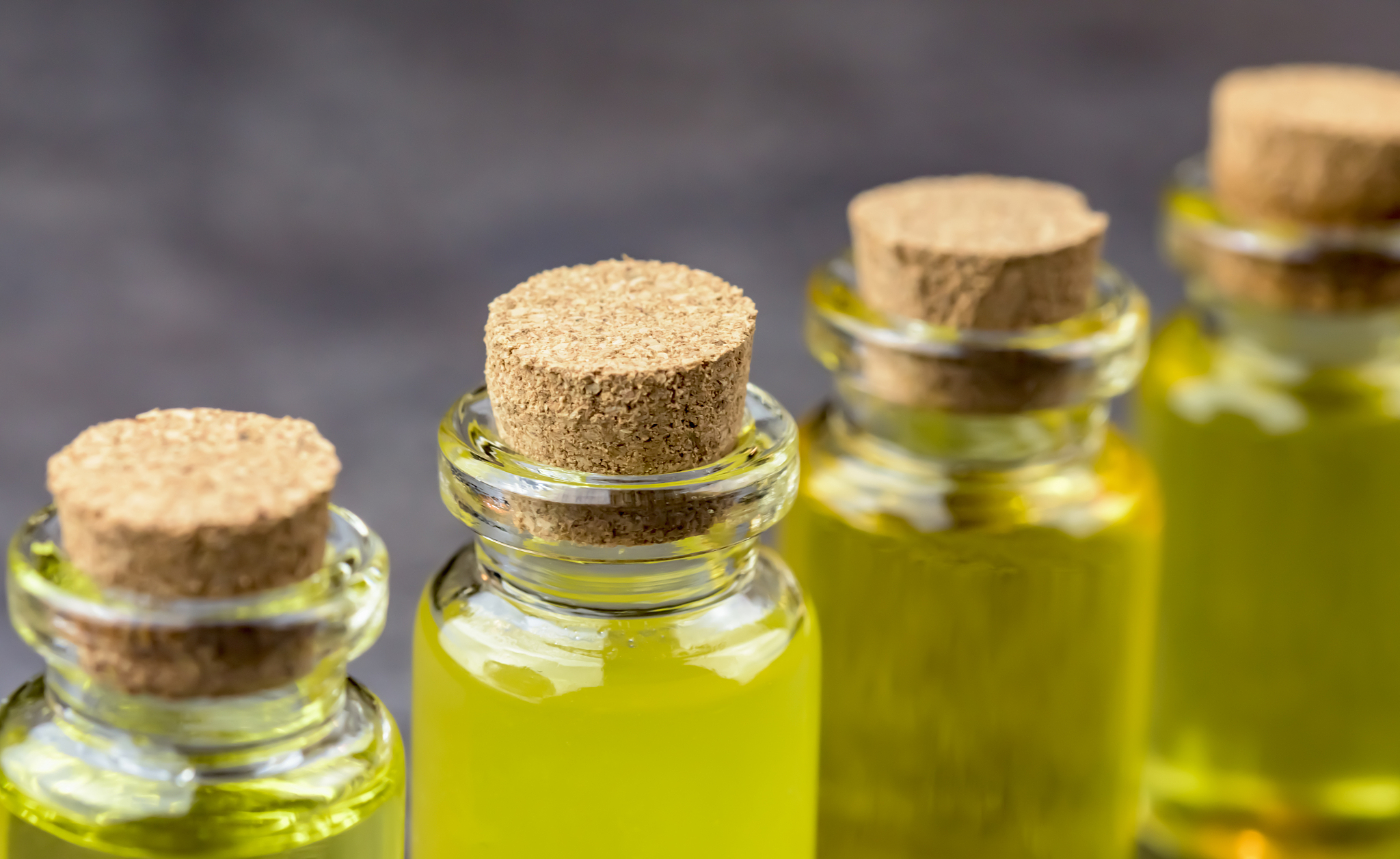 four bottles of different oils - source of omega acids