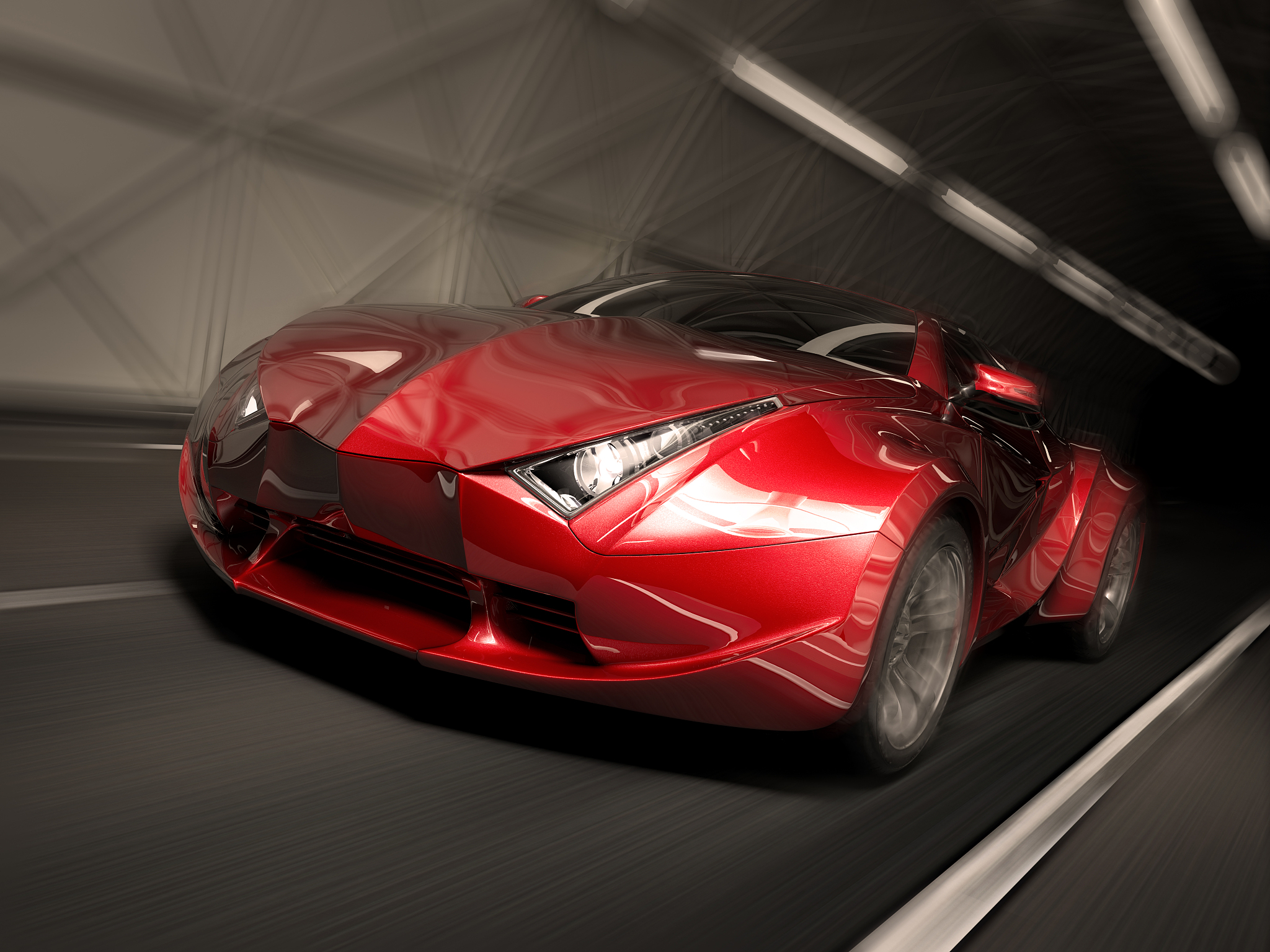 a red sports car driving really fast