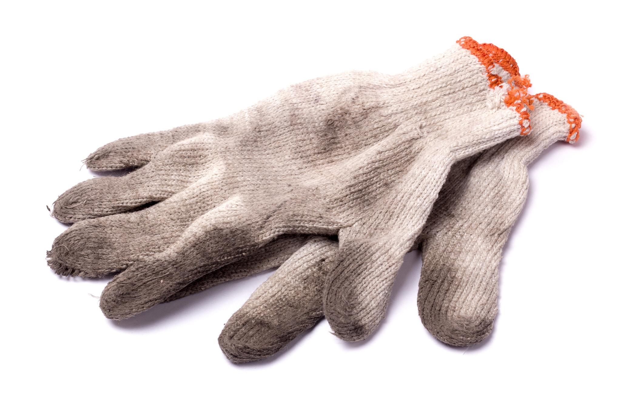 dirty gloves made of fabric isolated on white background