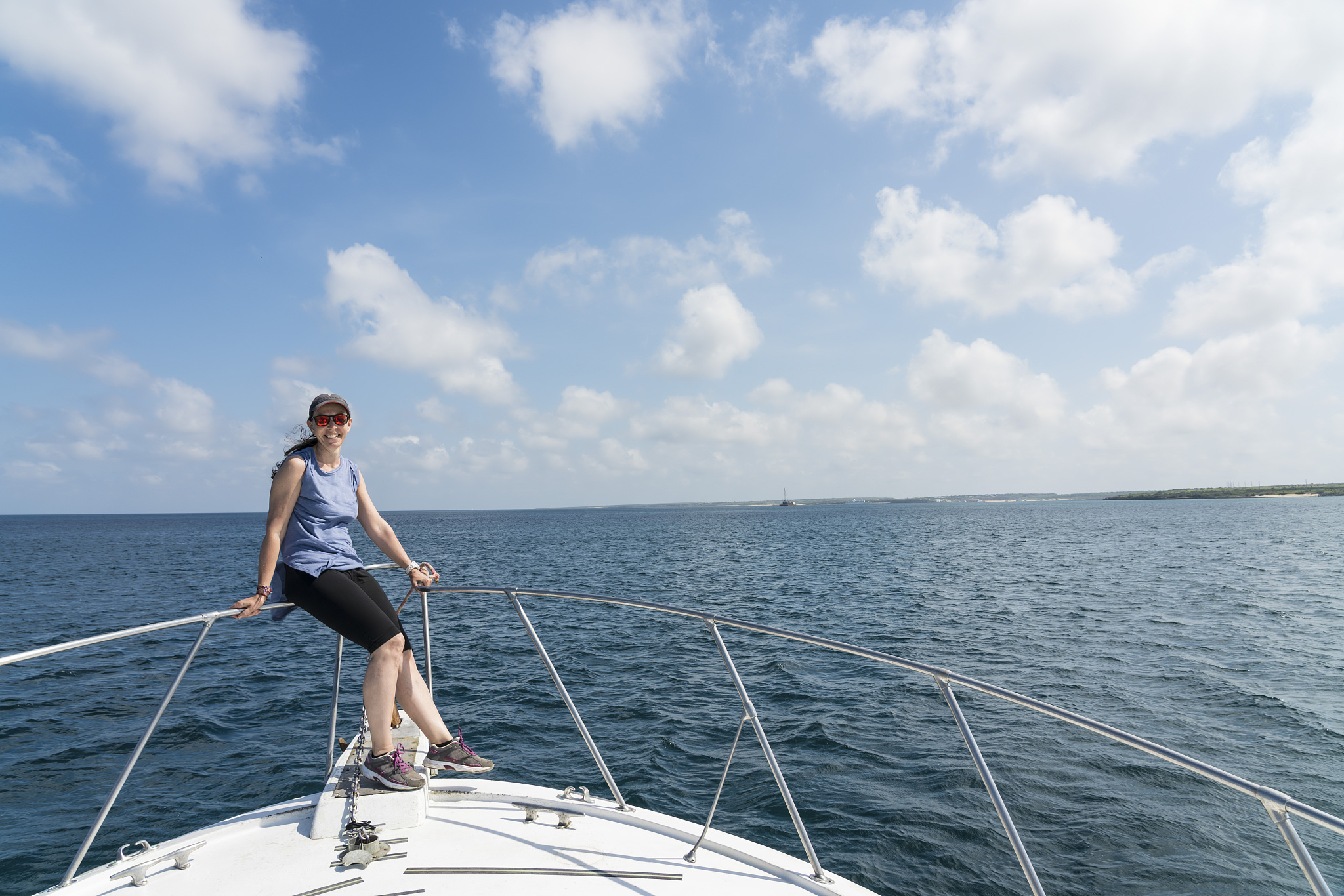 mature woman standing on the boat
