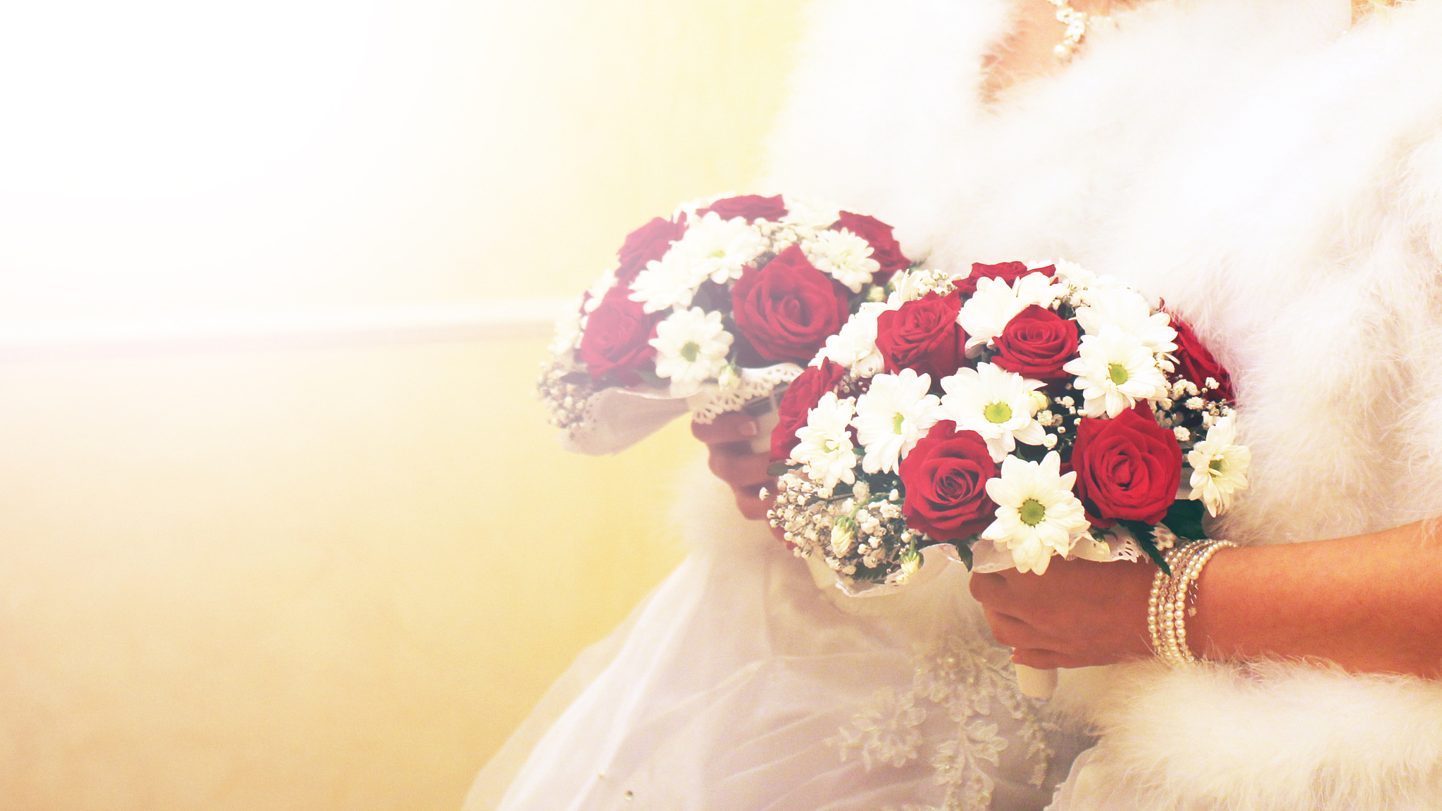 wedding bouquet in bride's hands, toned