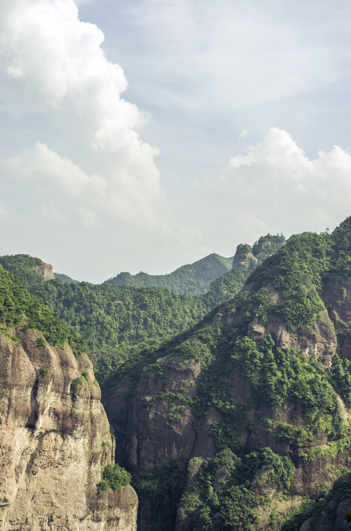 When wrf simulation test is conducted for extreme precipitation in henan province why does increasing the height of funiu mountain range and taihang mountain range in the west and northwest of henan p