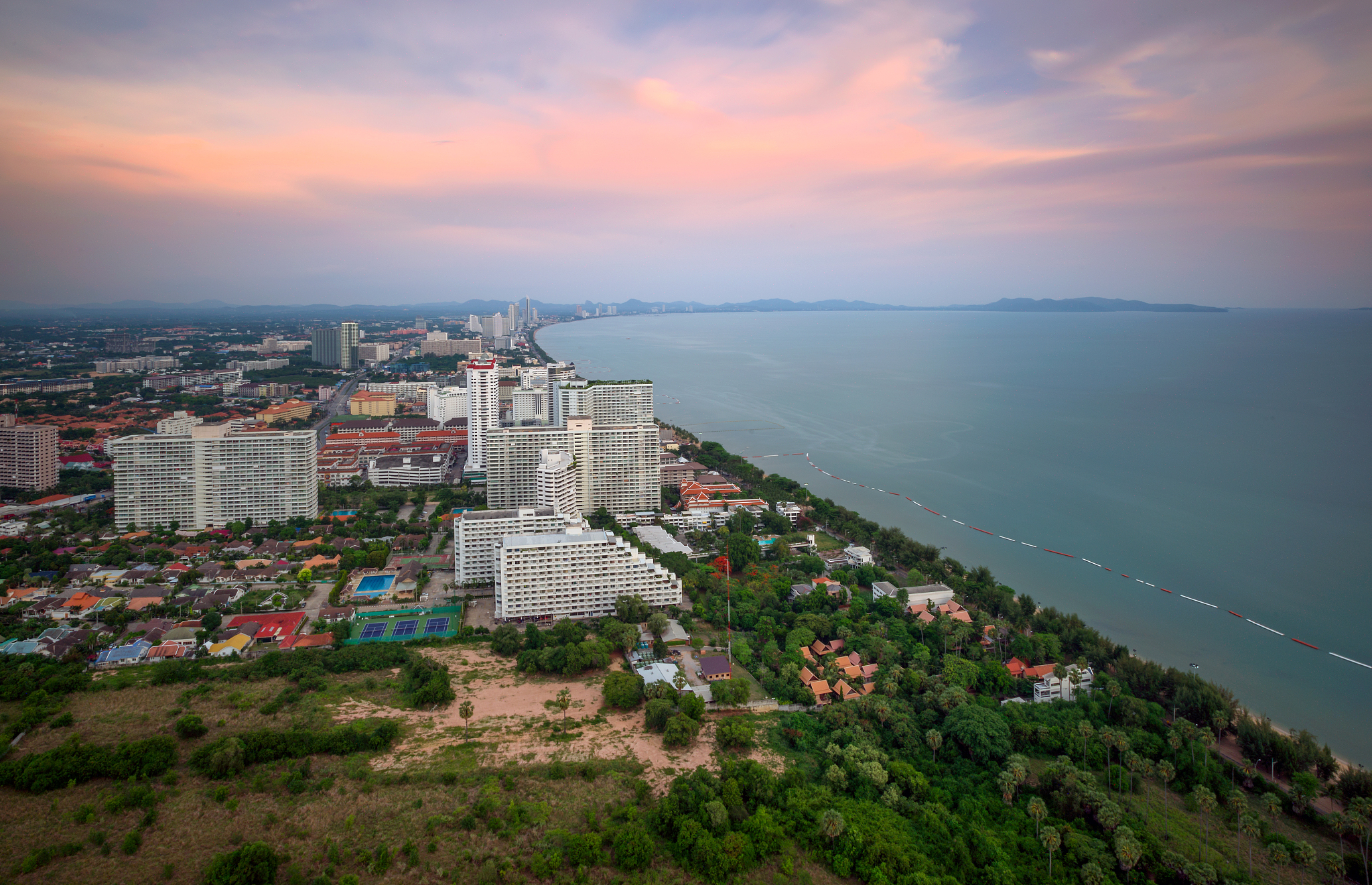 pattaya city and sea with blue sky, thailand. pattaya city skyli