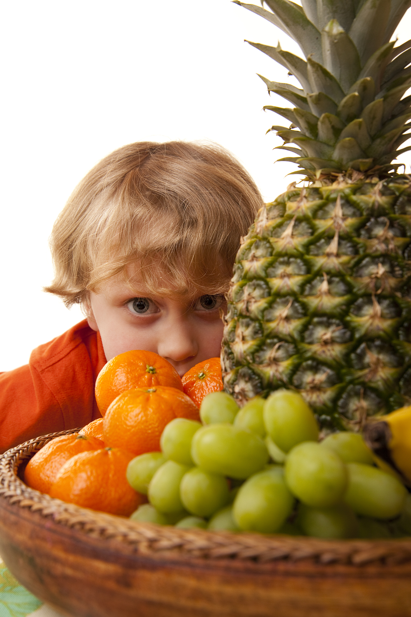child with a healthy fruit bowl