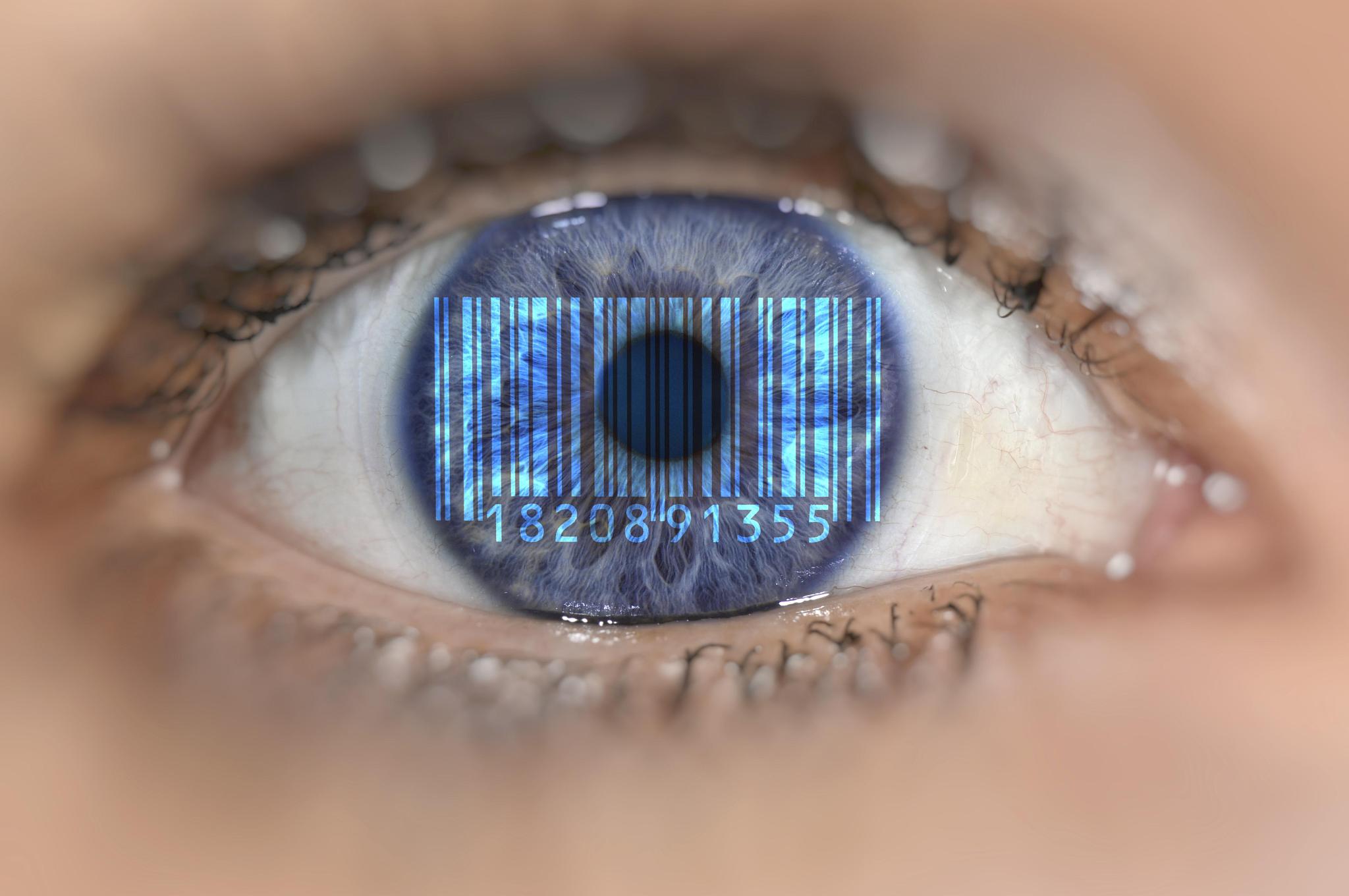 detail of eye with barcode eanan article number, on iris, symbol