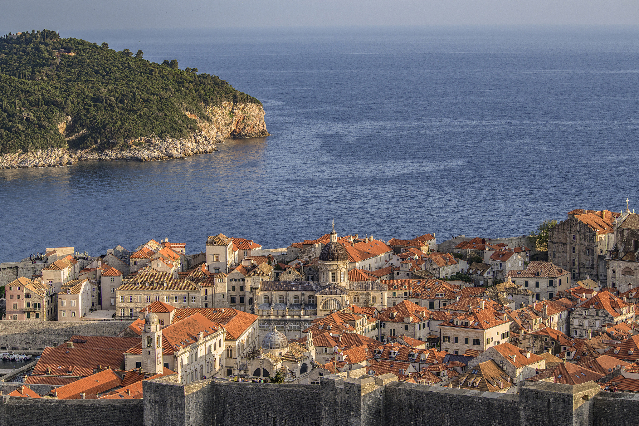 a bird's eye view of dubrovnik, the city walls and the island of