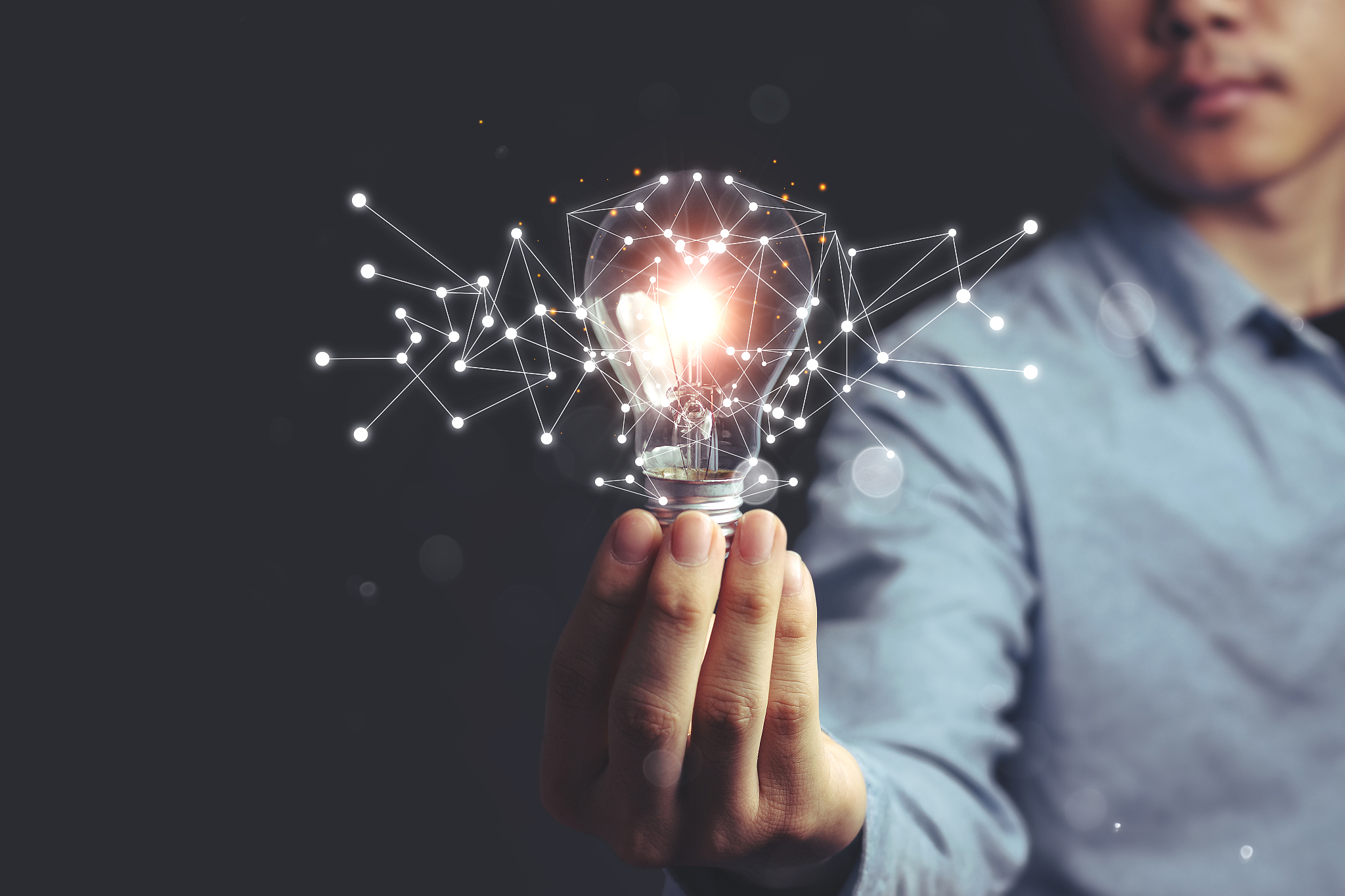 asian men holding light bulbs, ideas of new ideas with innovativ