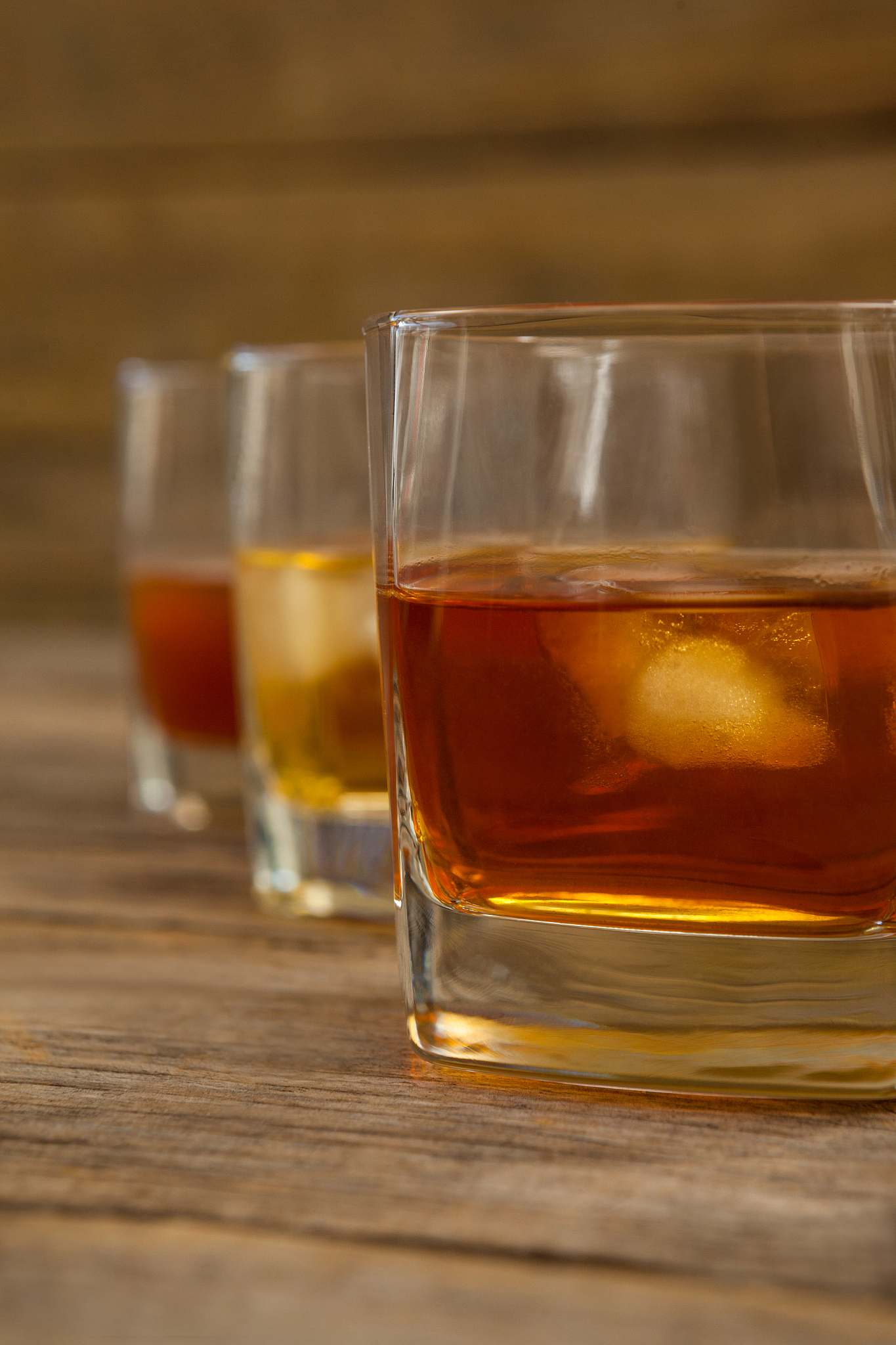 three glasses of whiskey