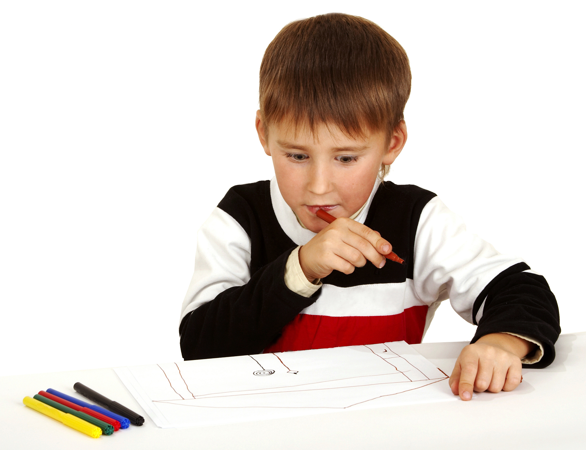 the little boy draws color pencils