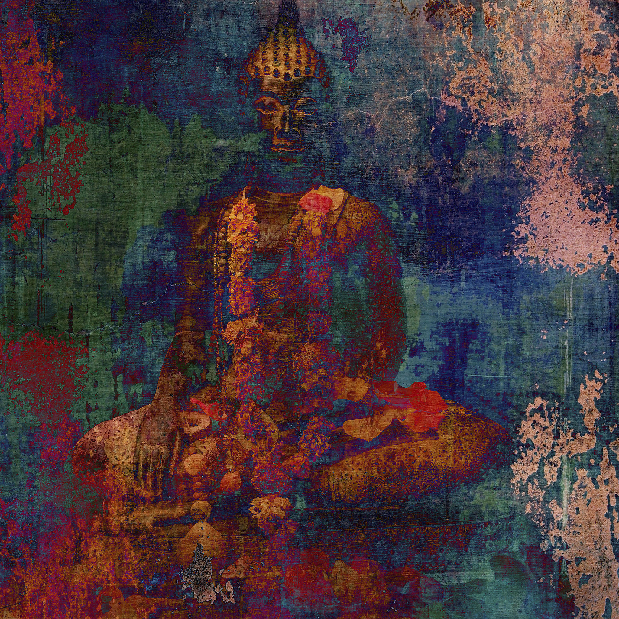buddhist statue decorated with garlands