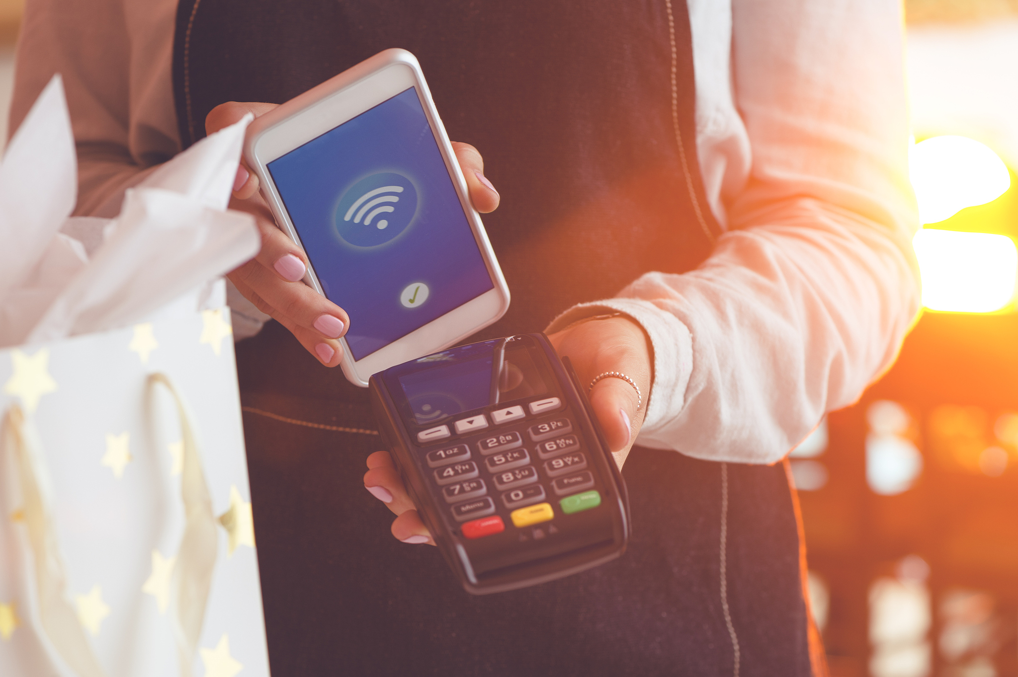 paying with a smart phone.