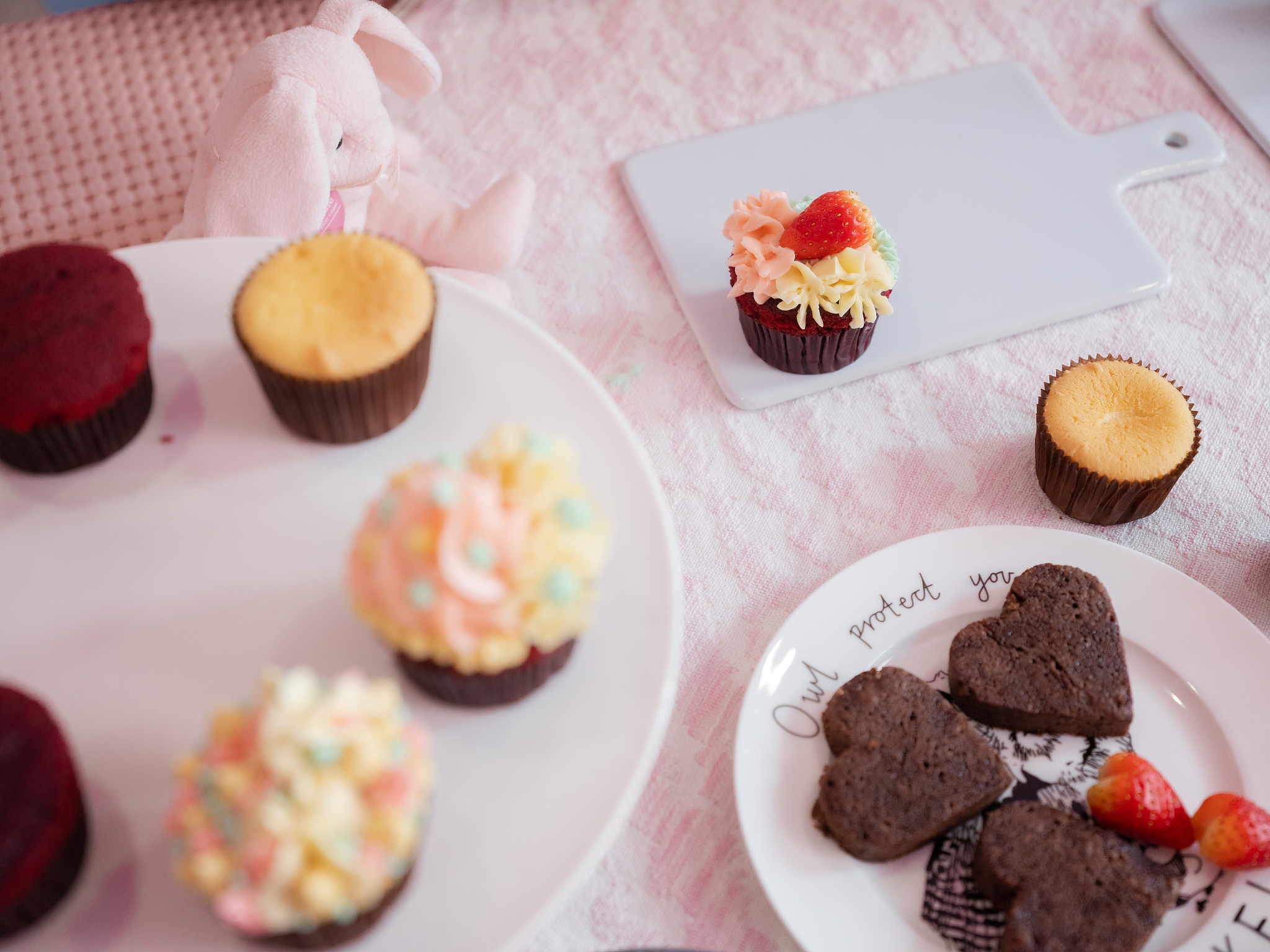pastel color cupcakes with heart shape brownies