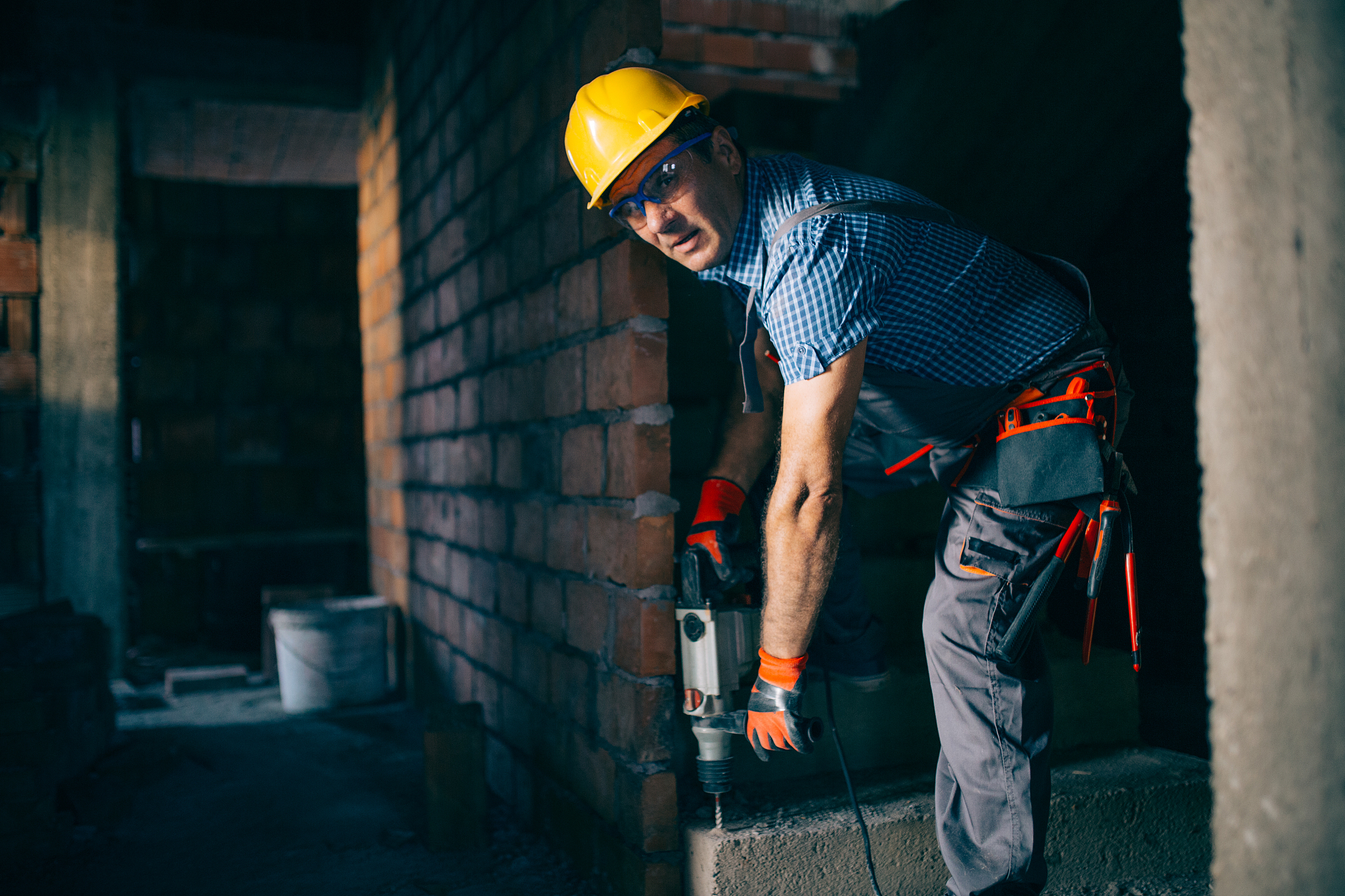 construction worker with a drill