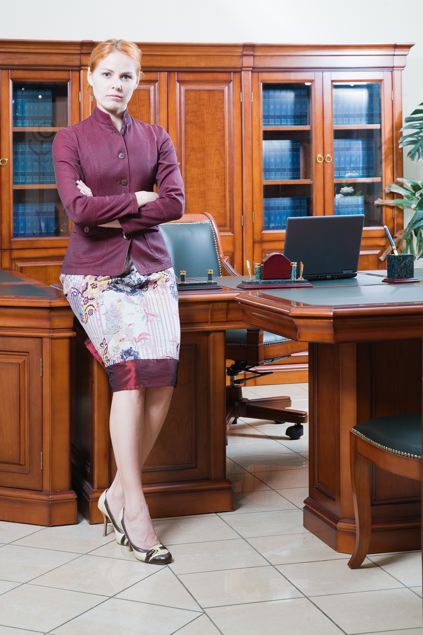 young woman in her office