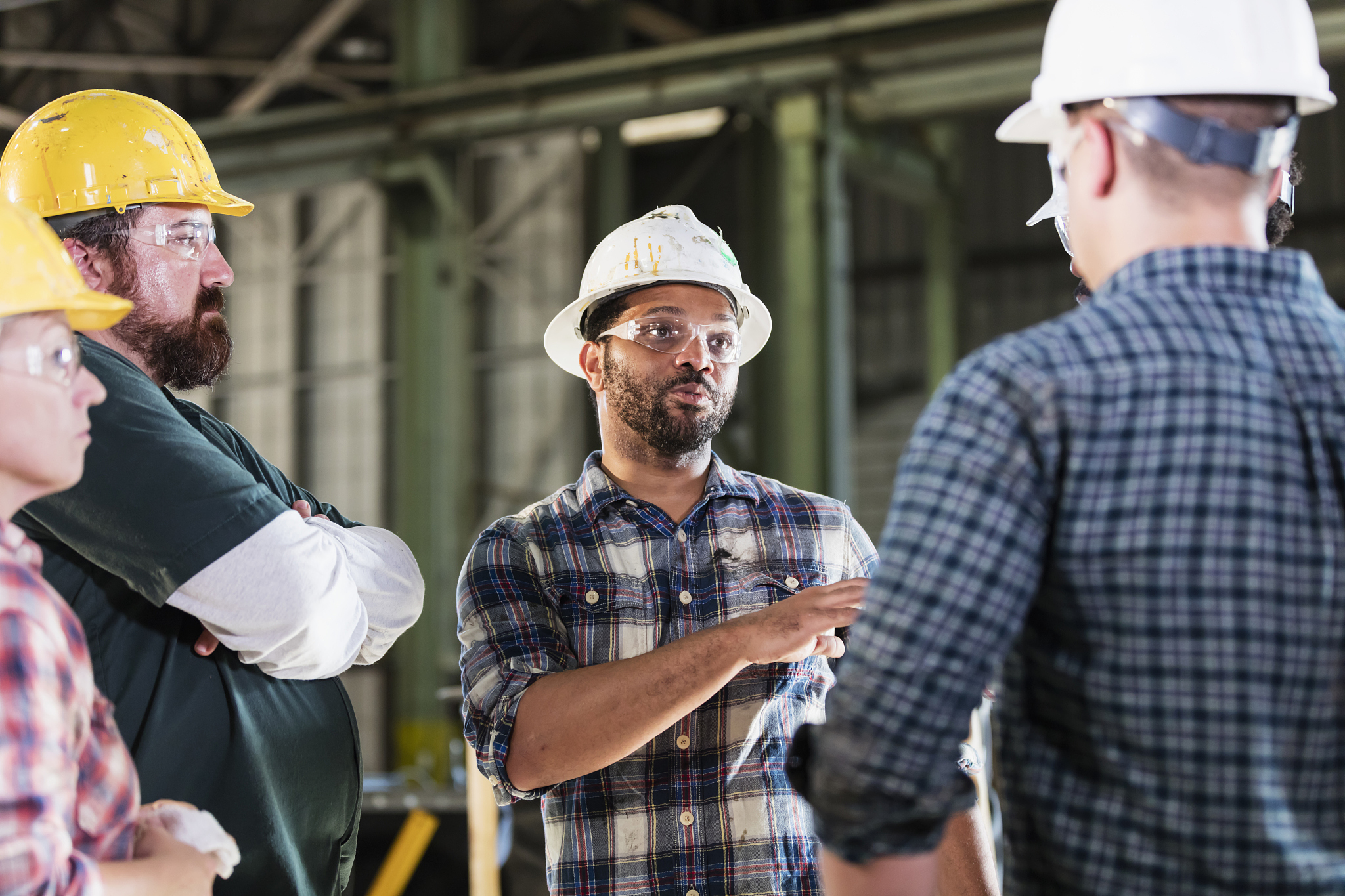 factory workers having a meeting