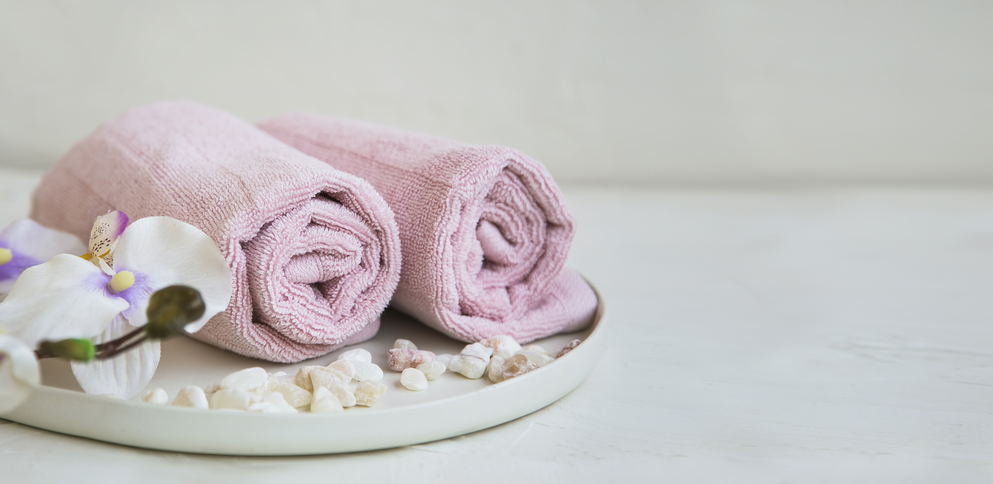 spa still life with orchid and towels, spa clean beauty backgrou