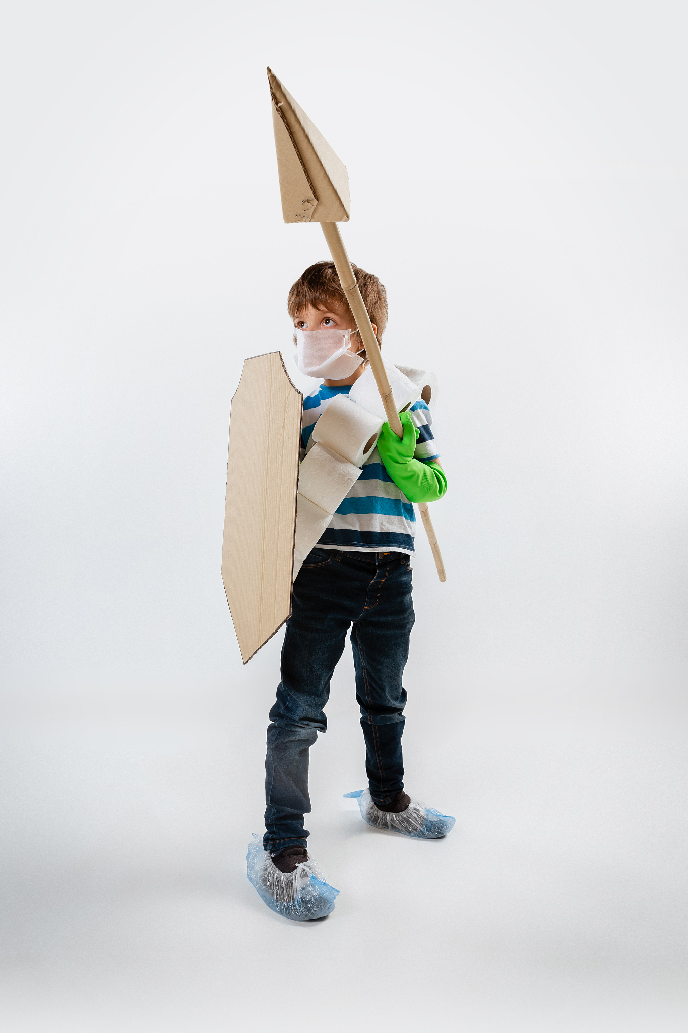 little caucasian boy as a warrior in fight with coronavirus pand