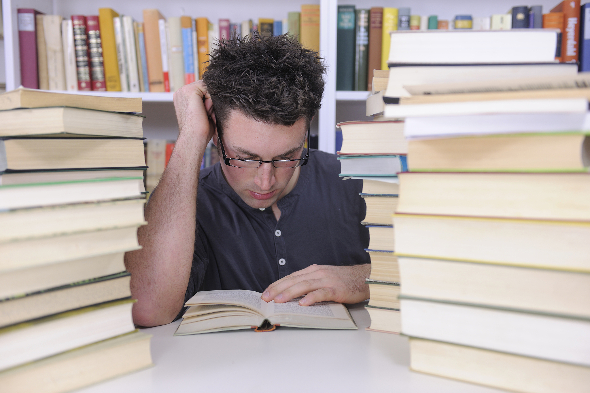 student studying in library