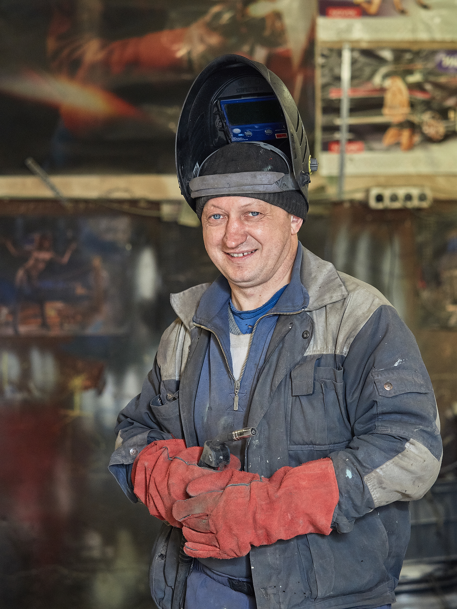 the smile of a welder.