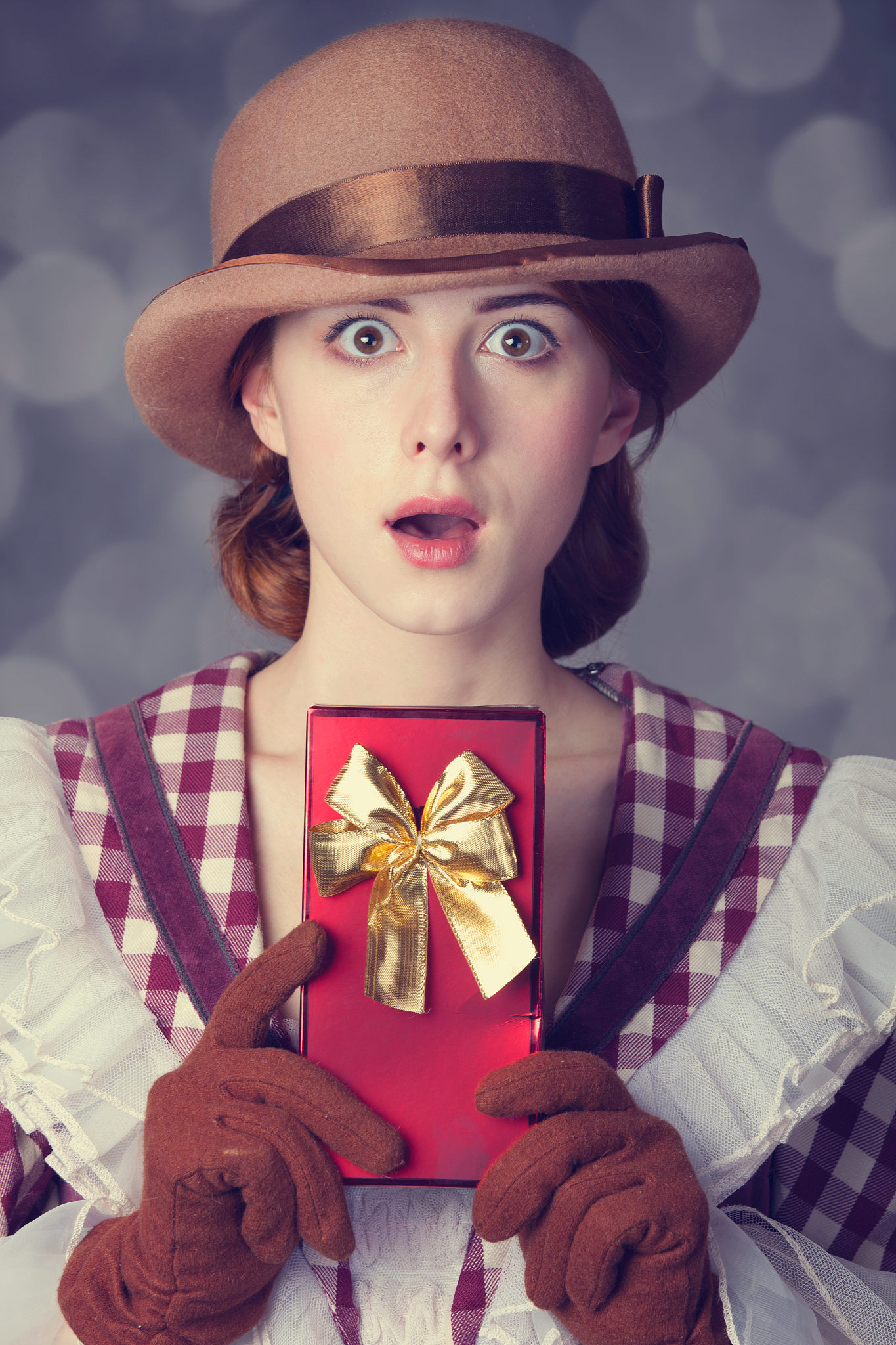 beautiful redhead women with gift.